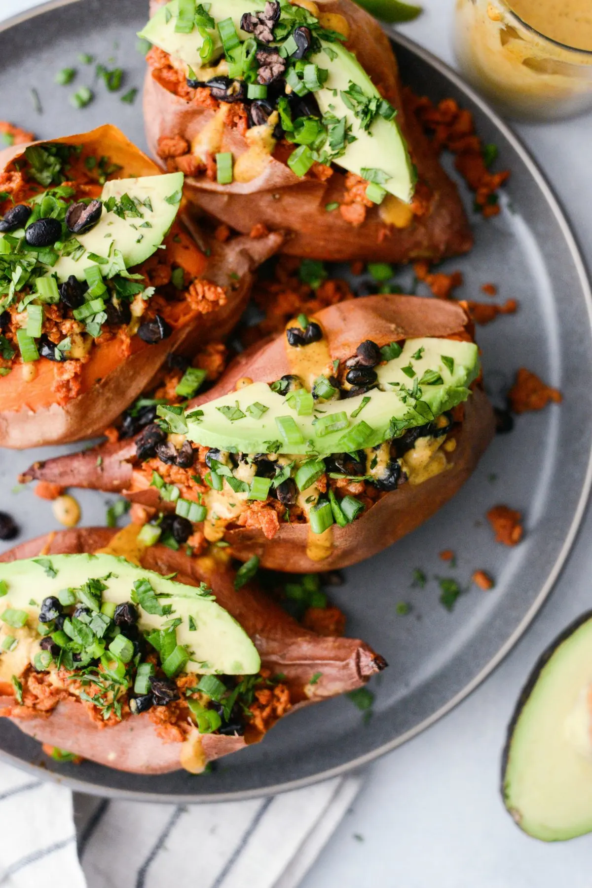 high-protein-anti-inflammatory:-stuffed-sweet-potato-with-black-beans-and-tahini-drizzle