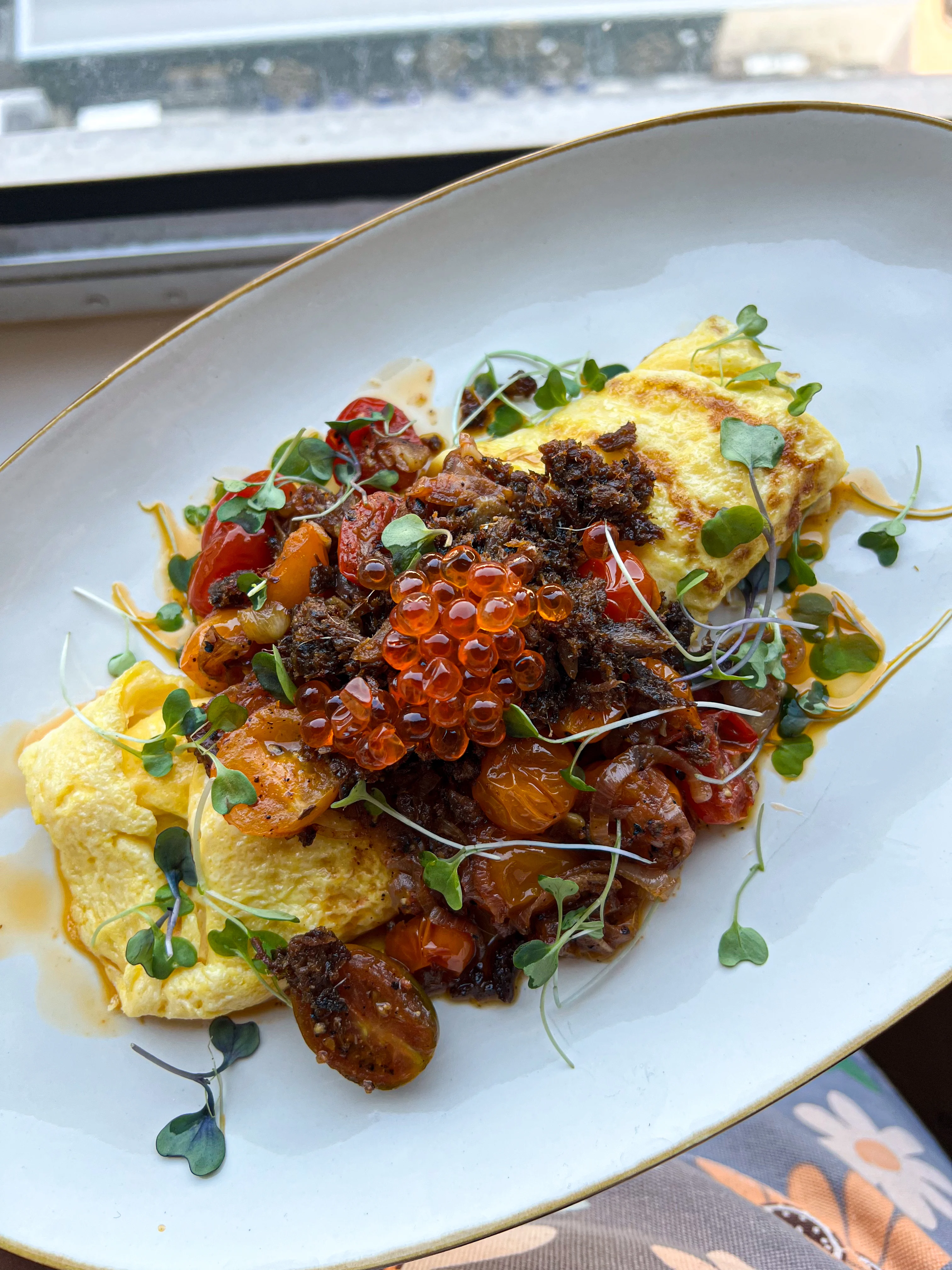 haitian-inspired-omelet-with-smoked-herring-tomatoes-and-caviar