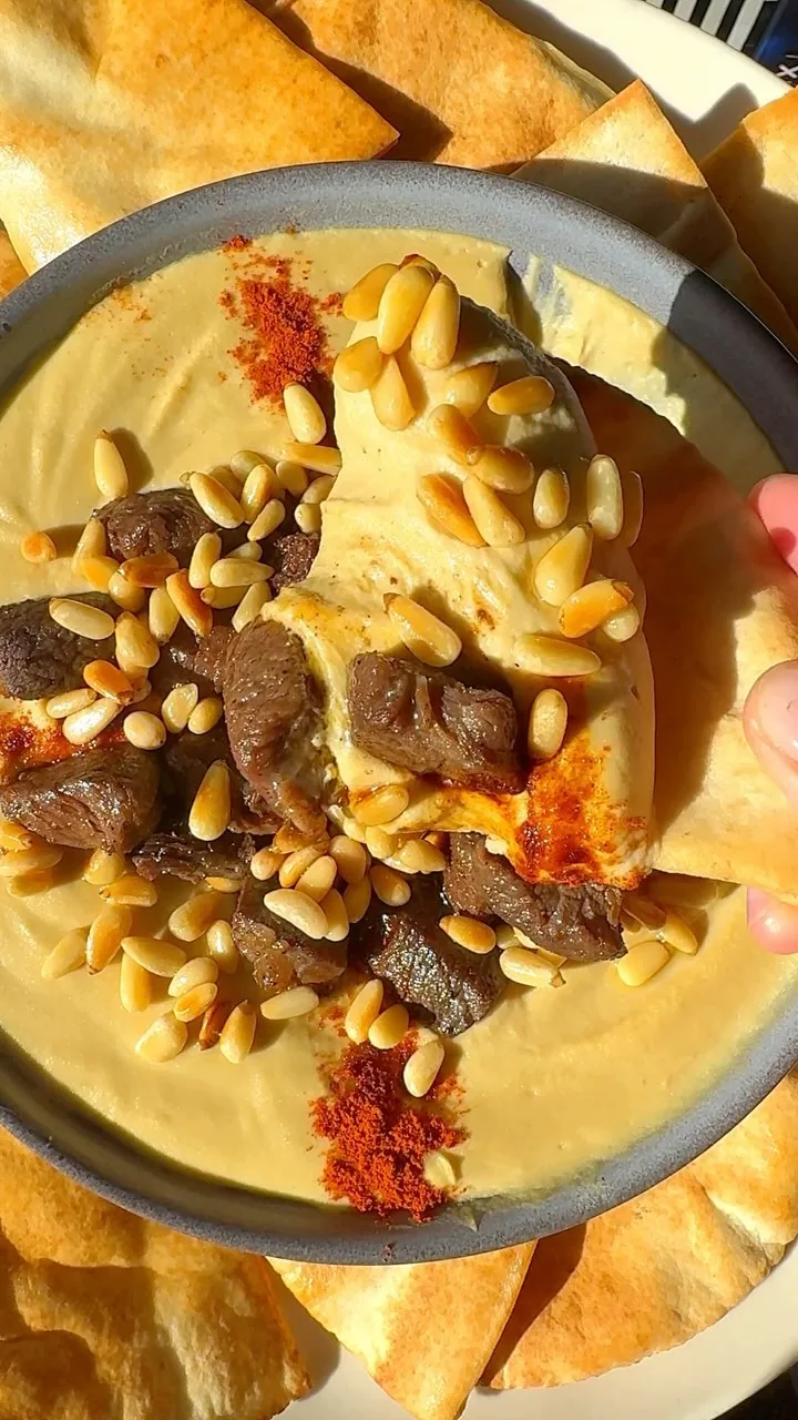 creamy-palestinian-hummus-with-spiced-meat-cubes-and-pine-seeds