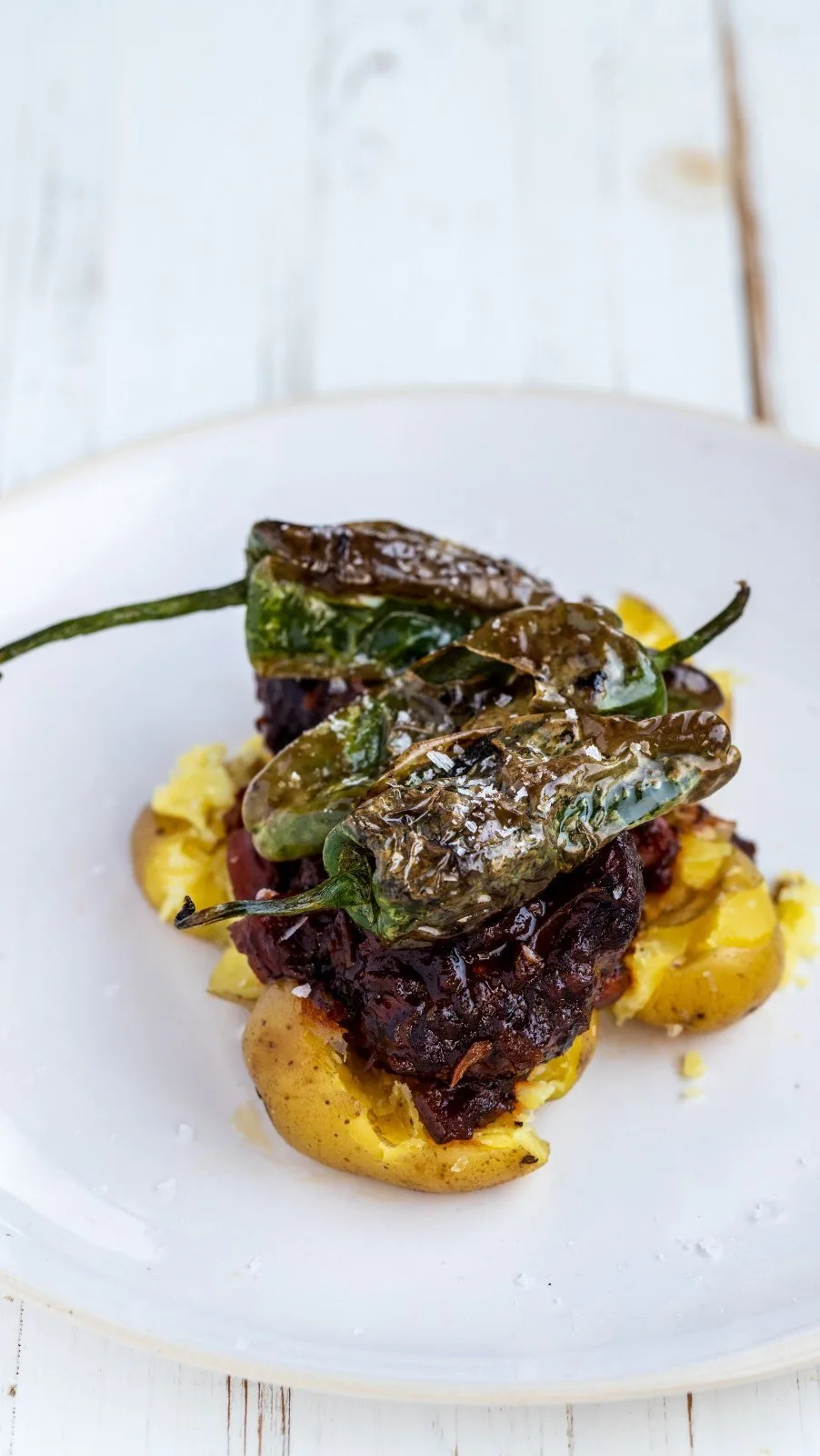 red-wine-braised-pork-cheeks-with-padron-peppers-and-smashed-potatoes