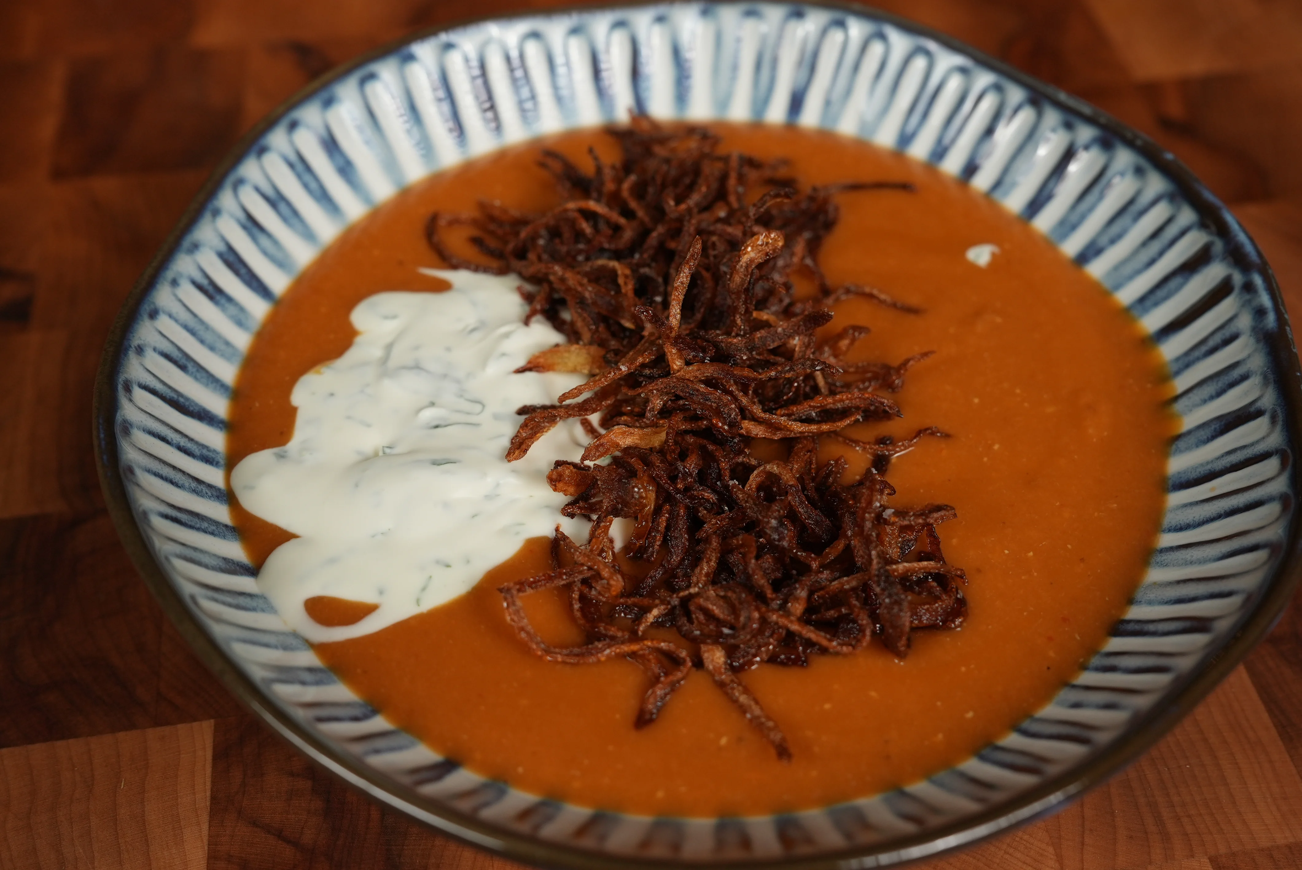 red-curry-lentil-soup-with-fried-onions-and-basil-lime-creme-fraiche