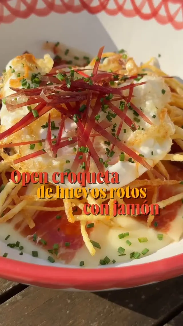 open-croqueta-of-huevos-rotos-con-jamon