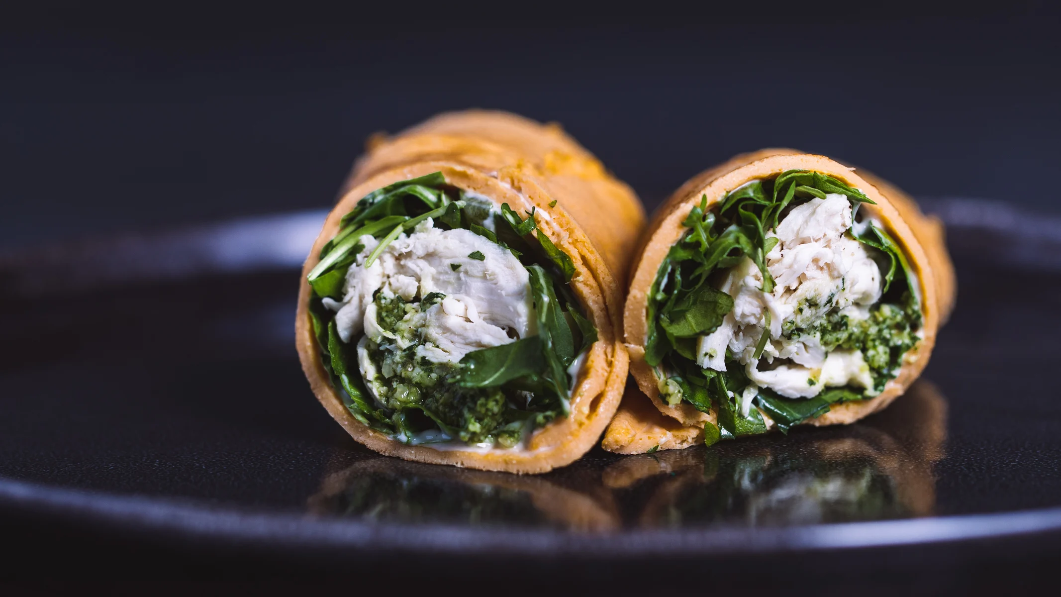 egg-wraps-with-pulled-lemon-pepper-chicken-breast-pesto-and-rocket