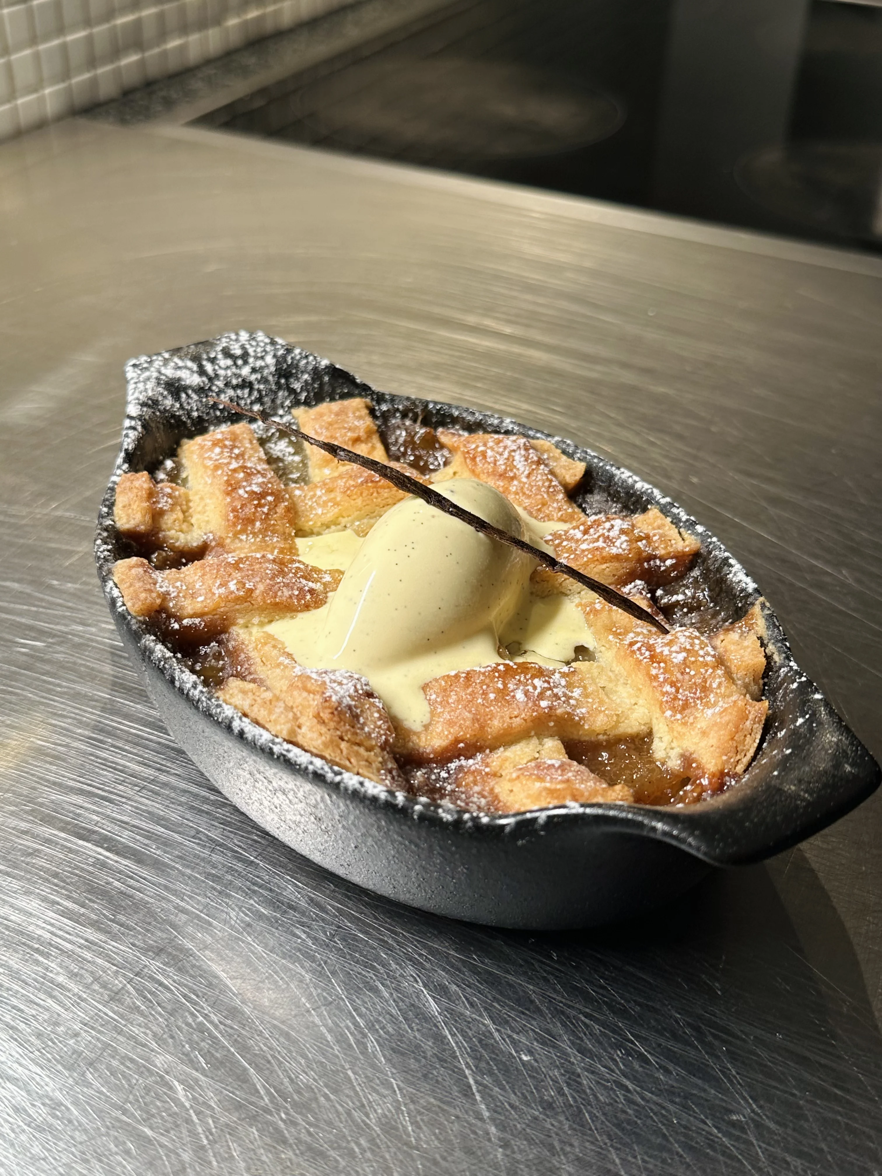hot-spiced-apple-and-walnut-pie-served-with-vanilla-ice-cream