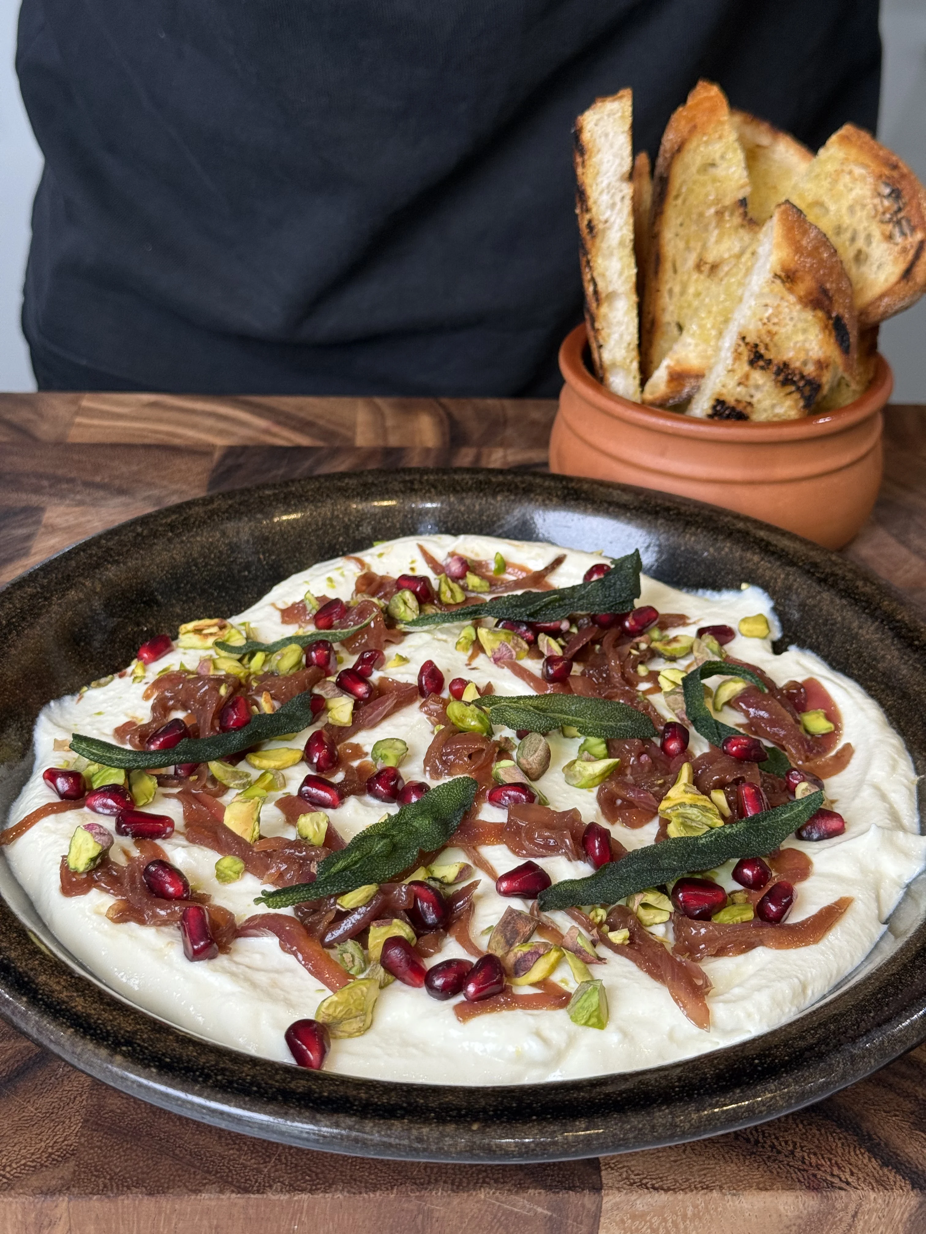 whipped-ricotta-with-caramelised-onions-pomegranate-and-pistachios