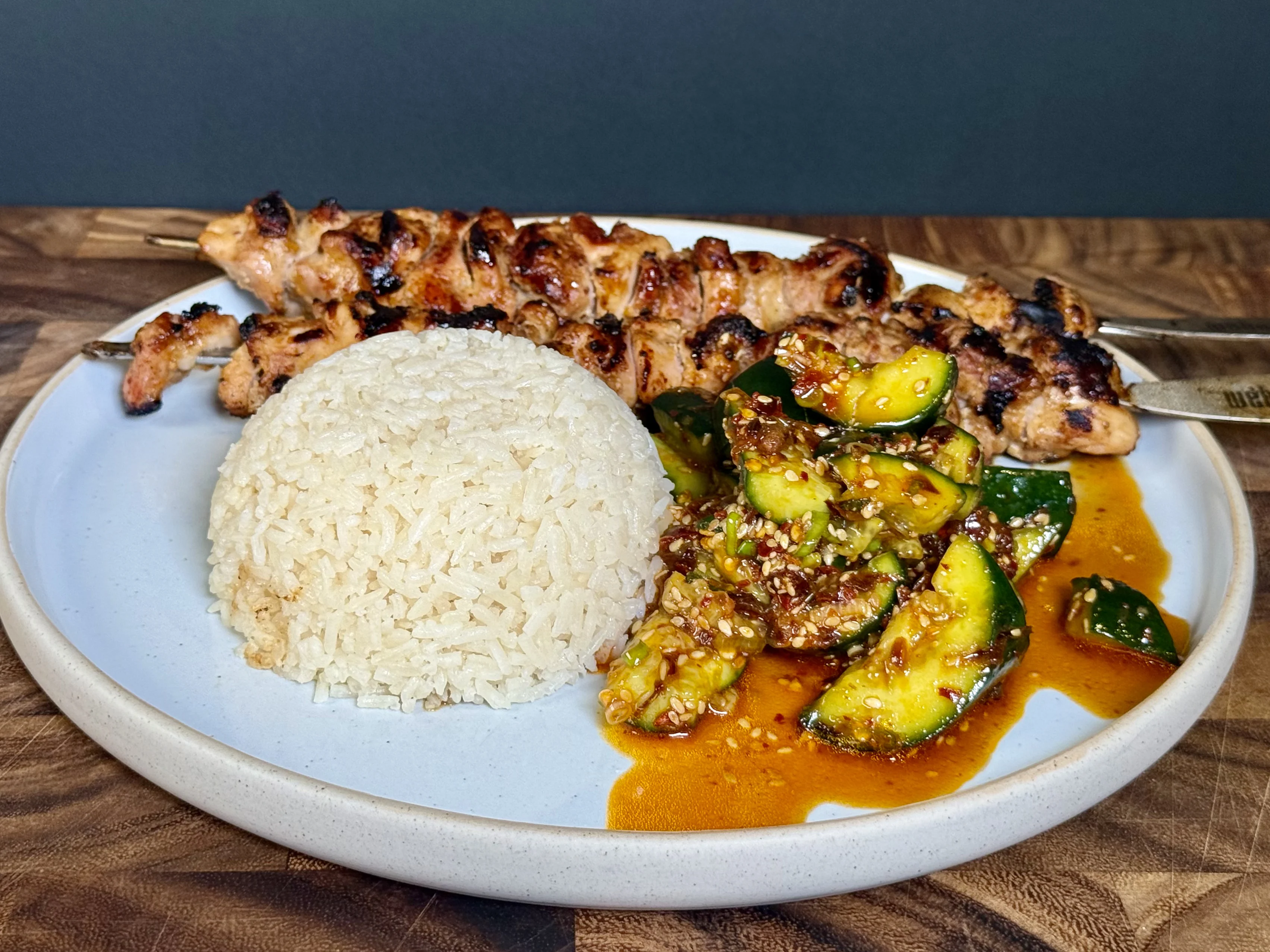 miso-chicken-skewers-with-chilli-crisp-smashed-cucumbers-and-ginger-rice
