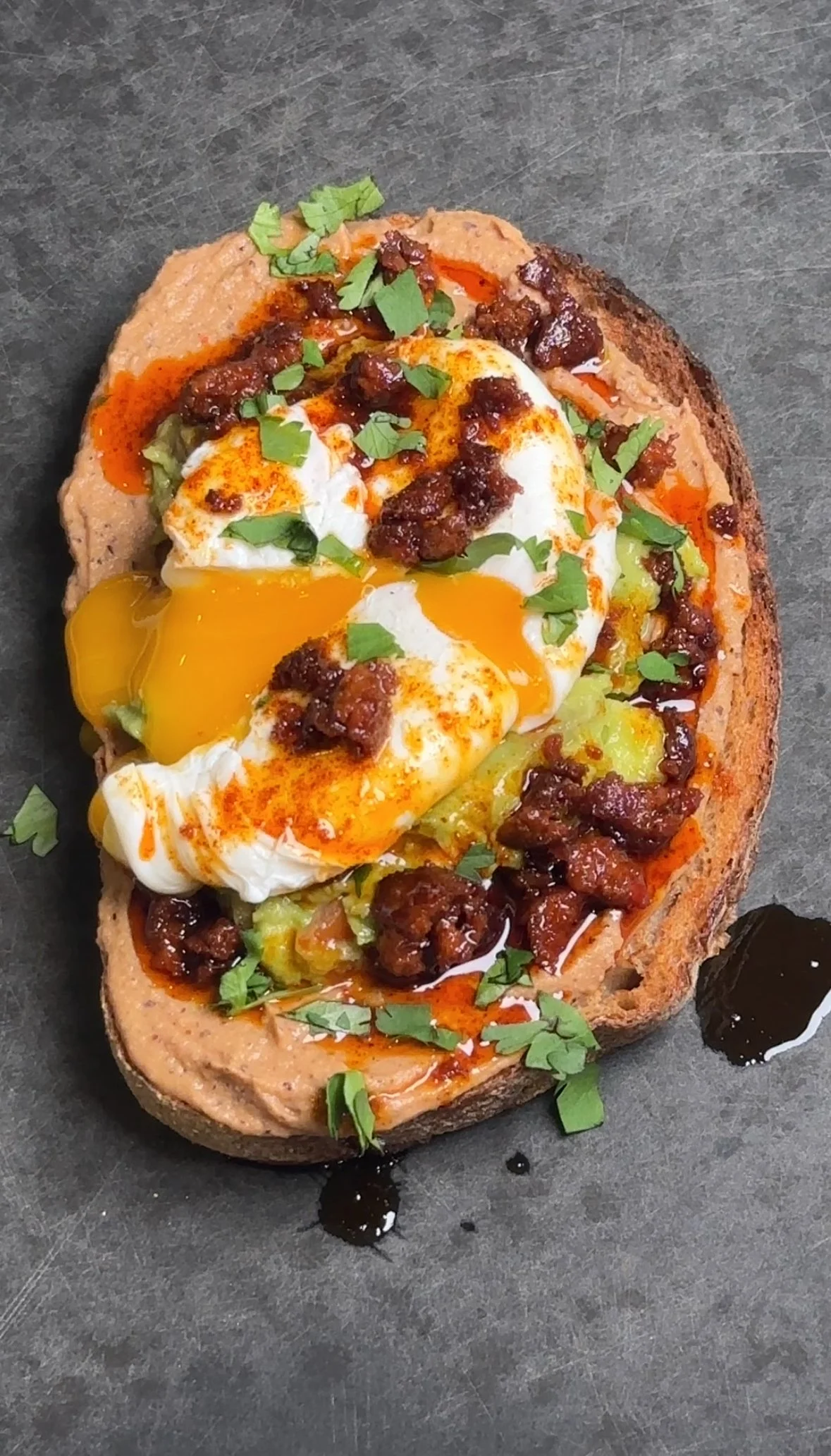 chorizo-and-egg-toast-with-guacamole-and-refried-beans