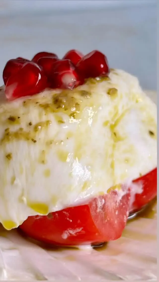 burrata-in-a-shell-with-pesto-oil-tomatoes-and-pomegranate