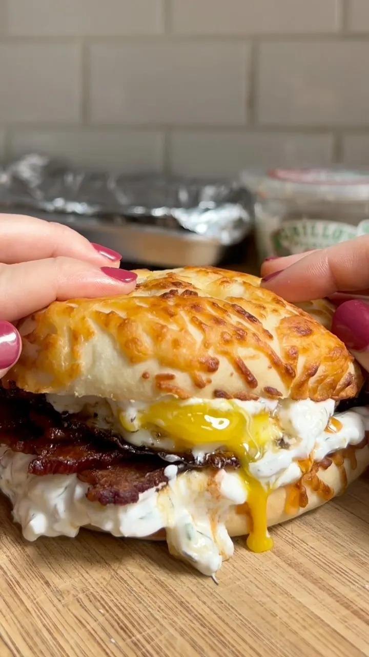 dill-pickle-cream-cheese-bacon-egg-breakfast-sandwich-on-an-asiago-bagel
