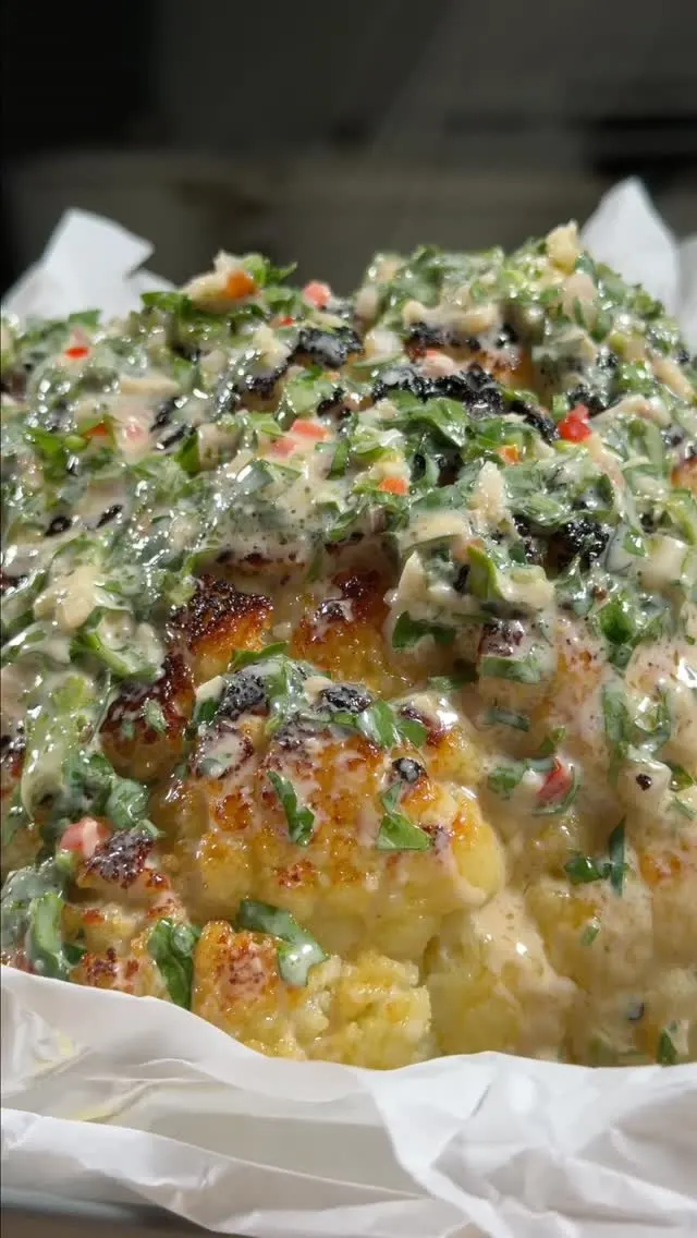 charred-cauliflower-with-chimichurri-and-tahini-miso-sauce