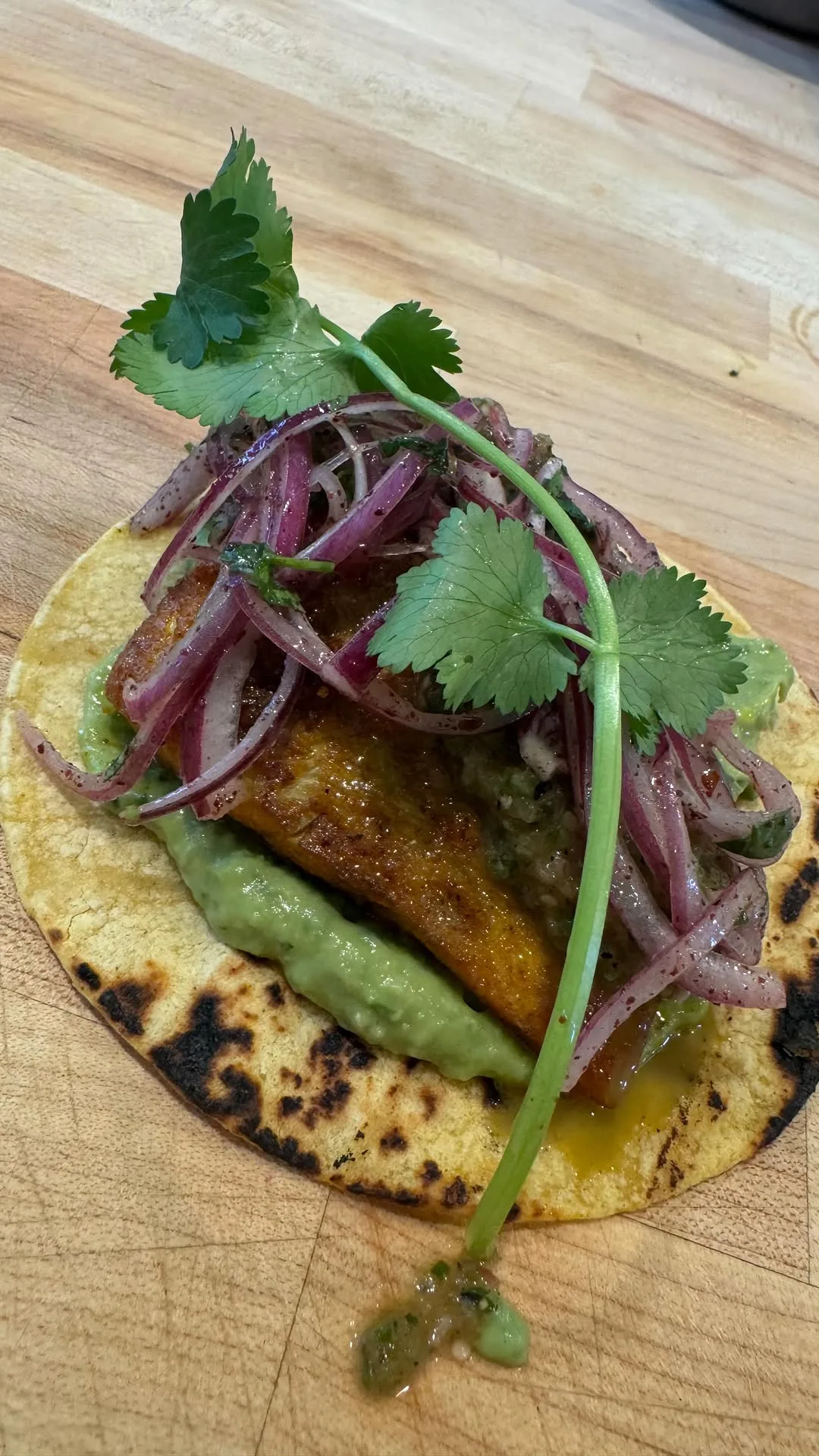 hawayaj-branzino-tacos-with-tomatillos-salsa-and-sumac-pickled-red-onions