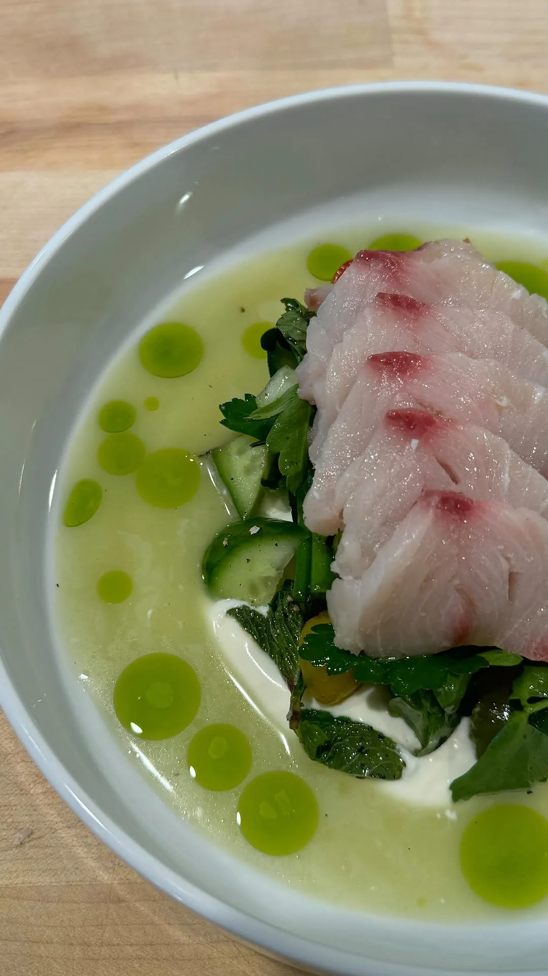 hamachi-crudo-with-yuzu-leche-de-tigre-creme-fraiche-and-charred-cucumber-scallion-salad