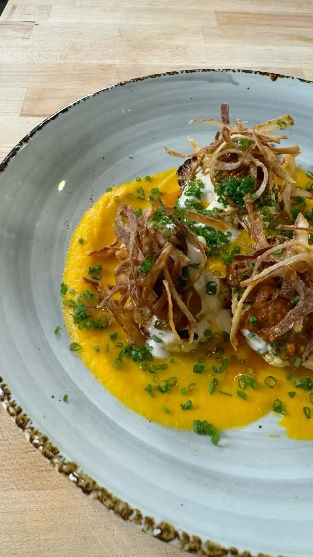 honey-nut-squash-puree-with-charred-cauliflower-sour-tahini-and-salsa-roja