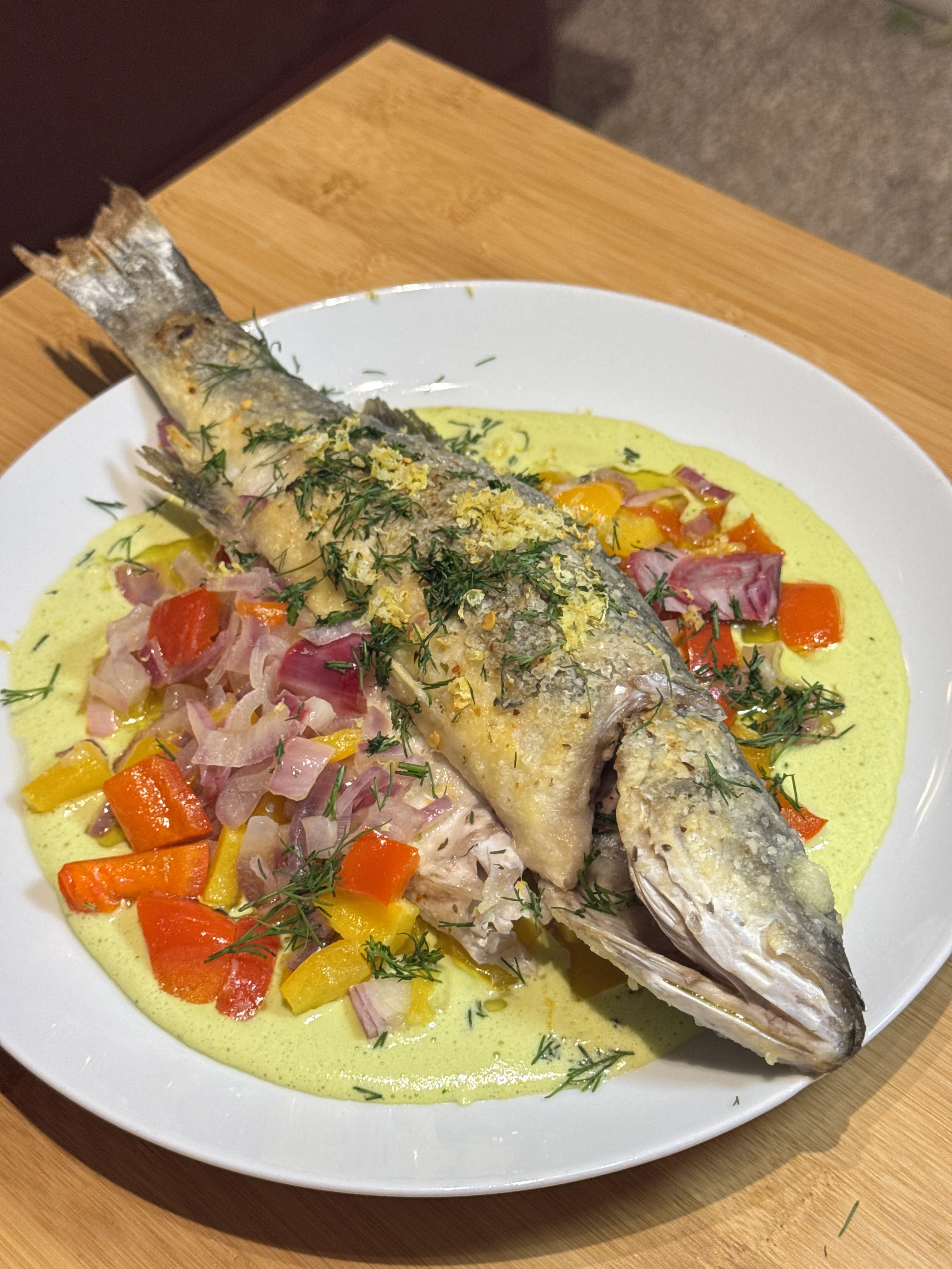 whole-roasted-branzino-with-lemon-dill-mayo-peppers-and-onions