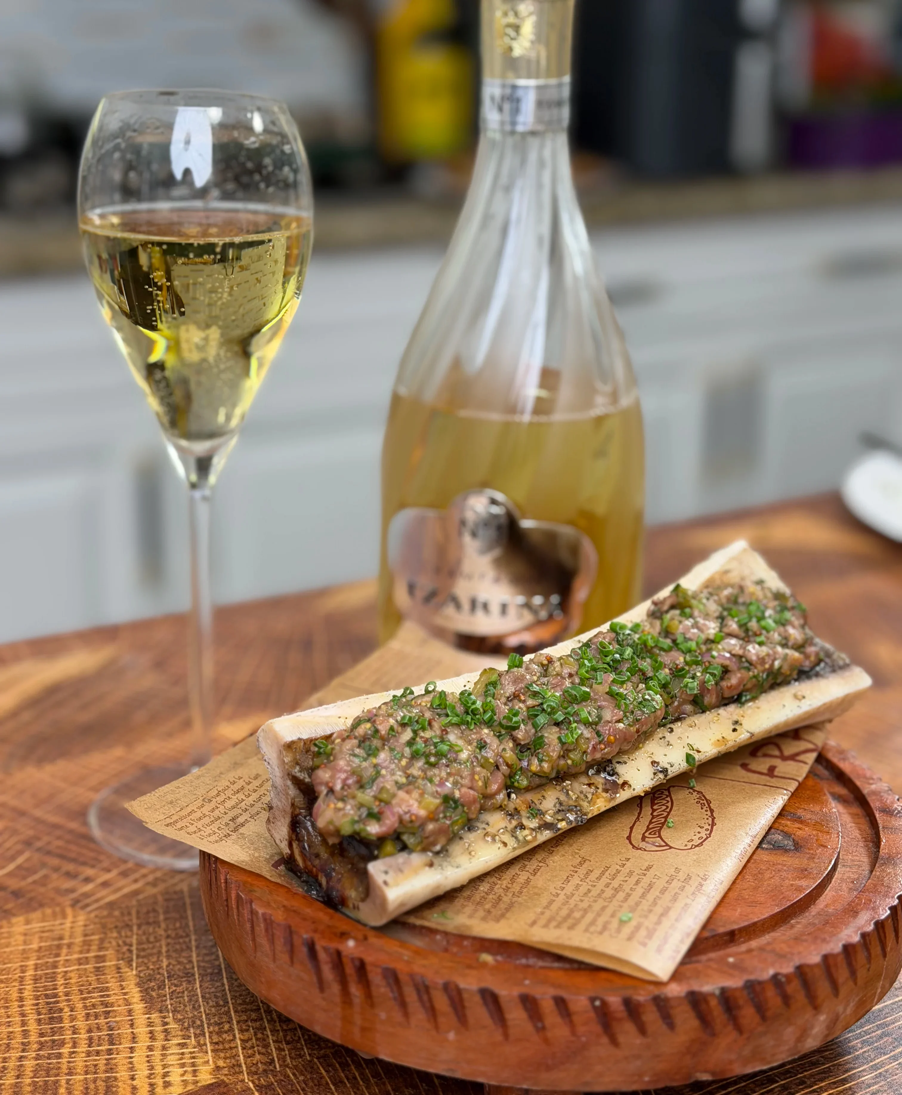 smoky-steak-tartare-served-on-bone-marrow