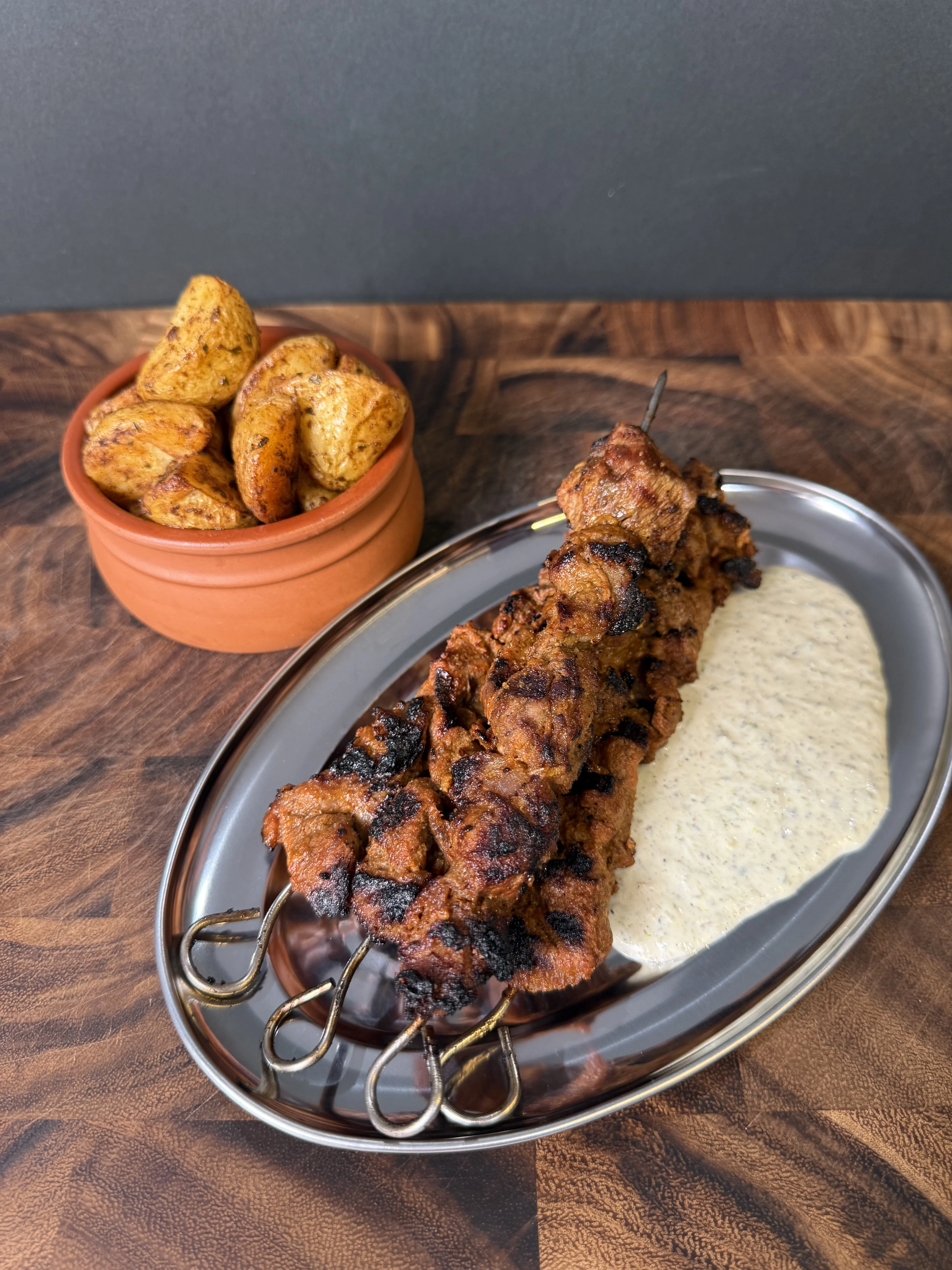 harissa-lamb-skewers-with-charred-spring-onion-yoghurt-sauce
