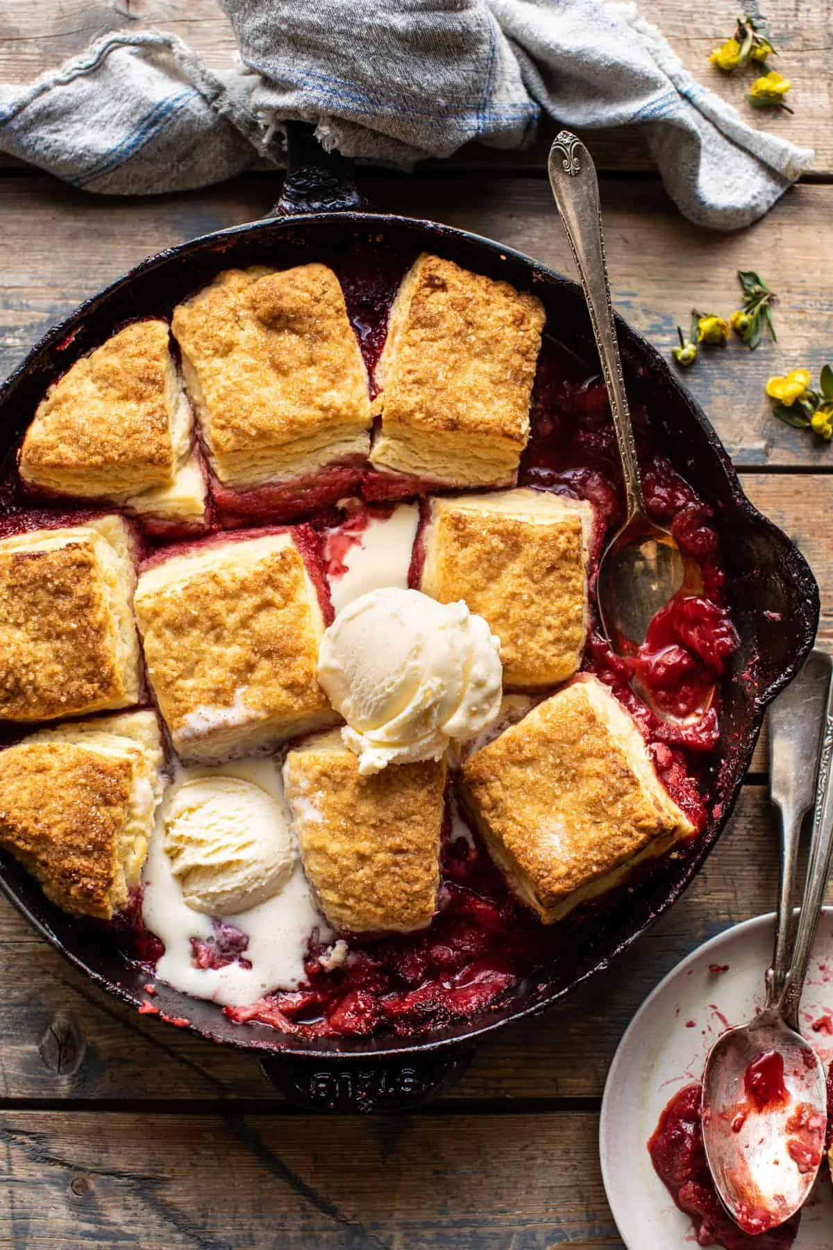 skillet-strawberry-bourbon-cobbler-with-layered-cream-cheese-biscuits