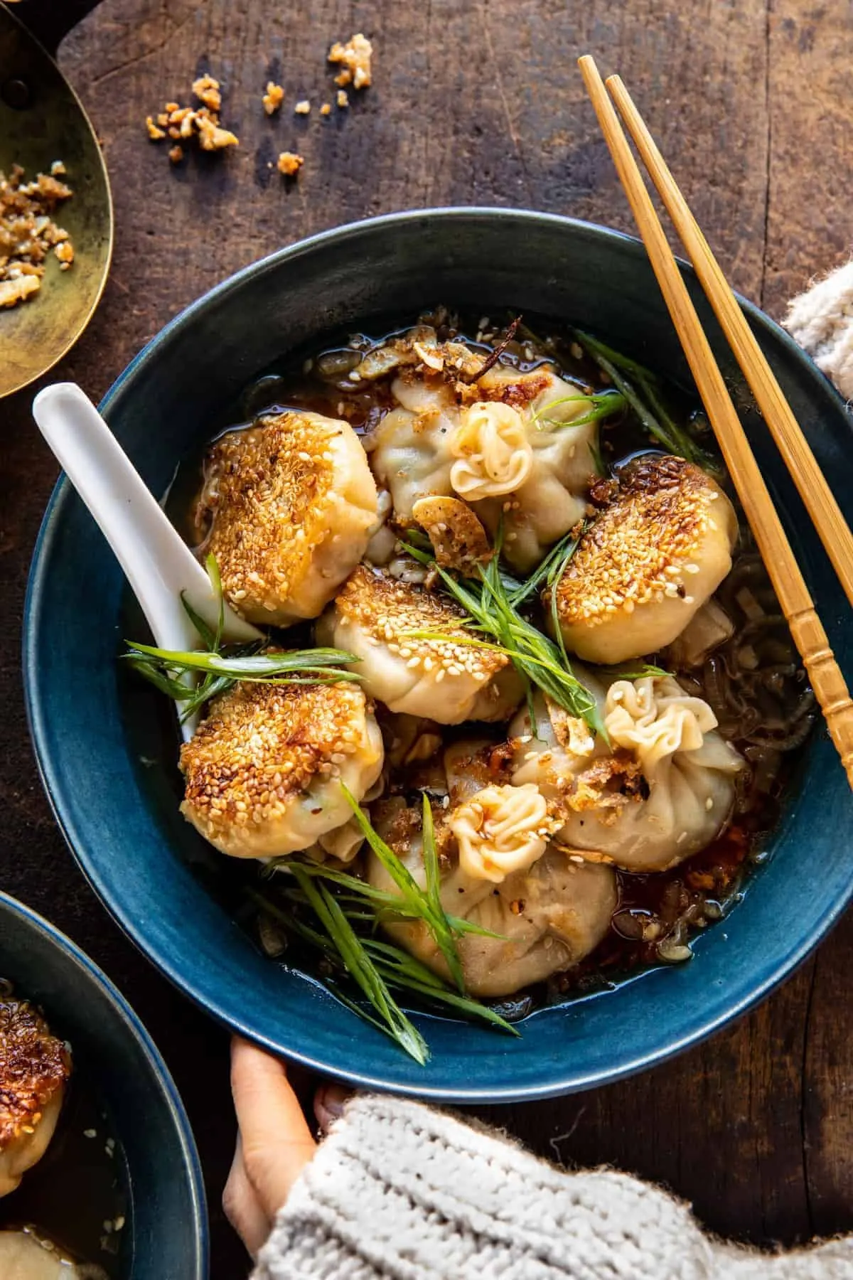 sesame-chicken-dumplings-in-spicy-broth-with-garlic-crisps