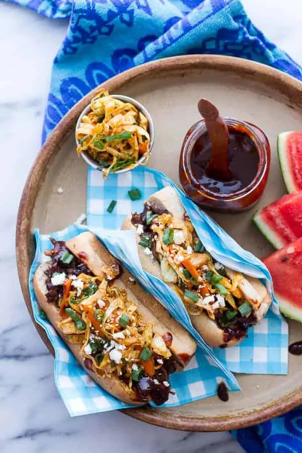 grilled-korean-bbq-short-rib-dogs-wsweet-peach-relish-spicy-korean-slaw.