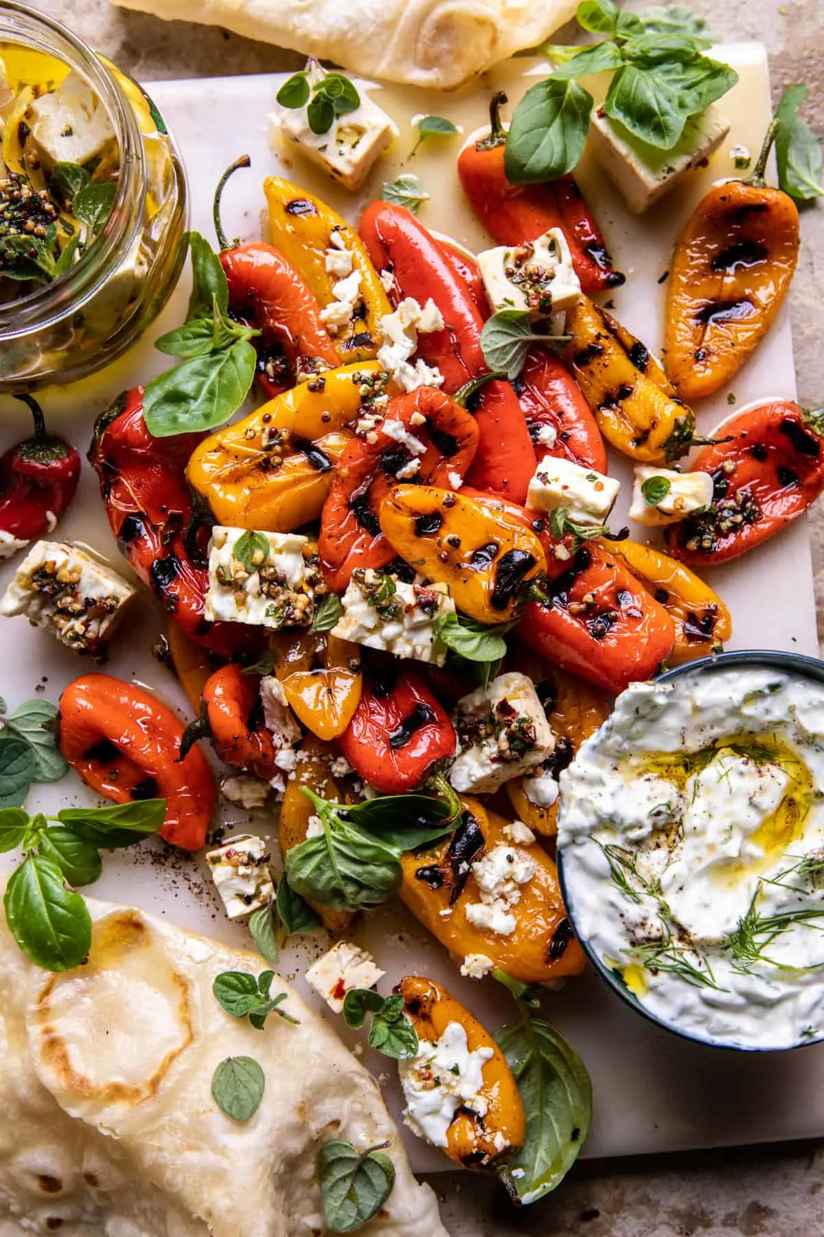 charred-peppers-with-marinated-feta-and-tzatziki