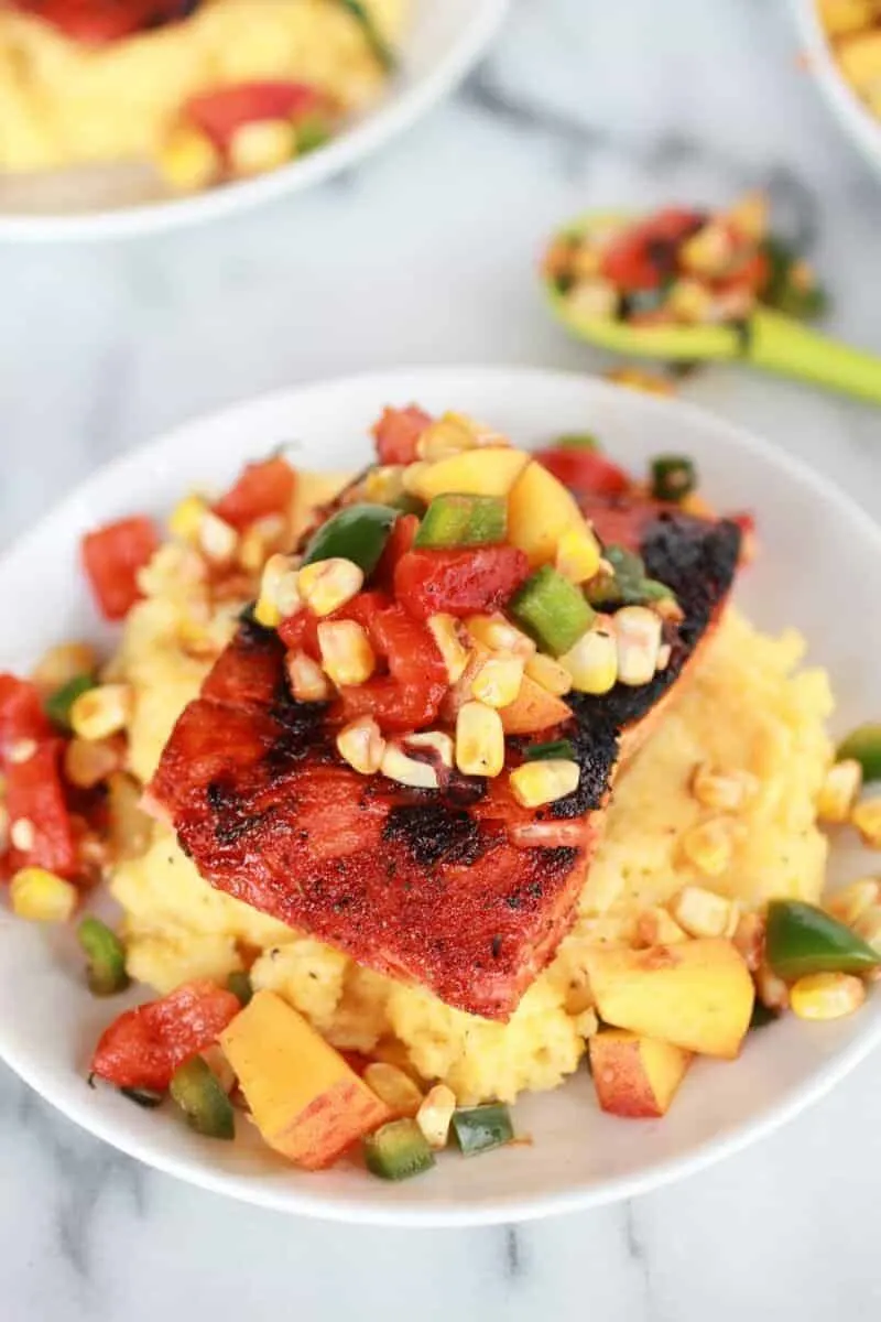 blackened-salmon-with-cheesy-polenta-and-spicy-peach-chard-corn-salsa