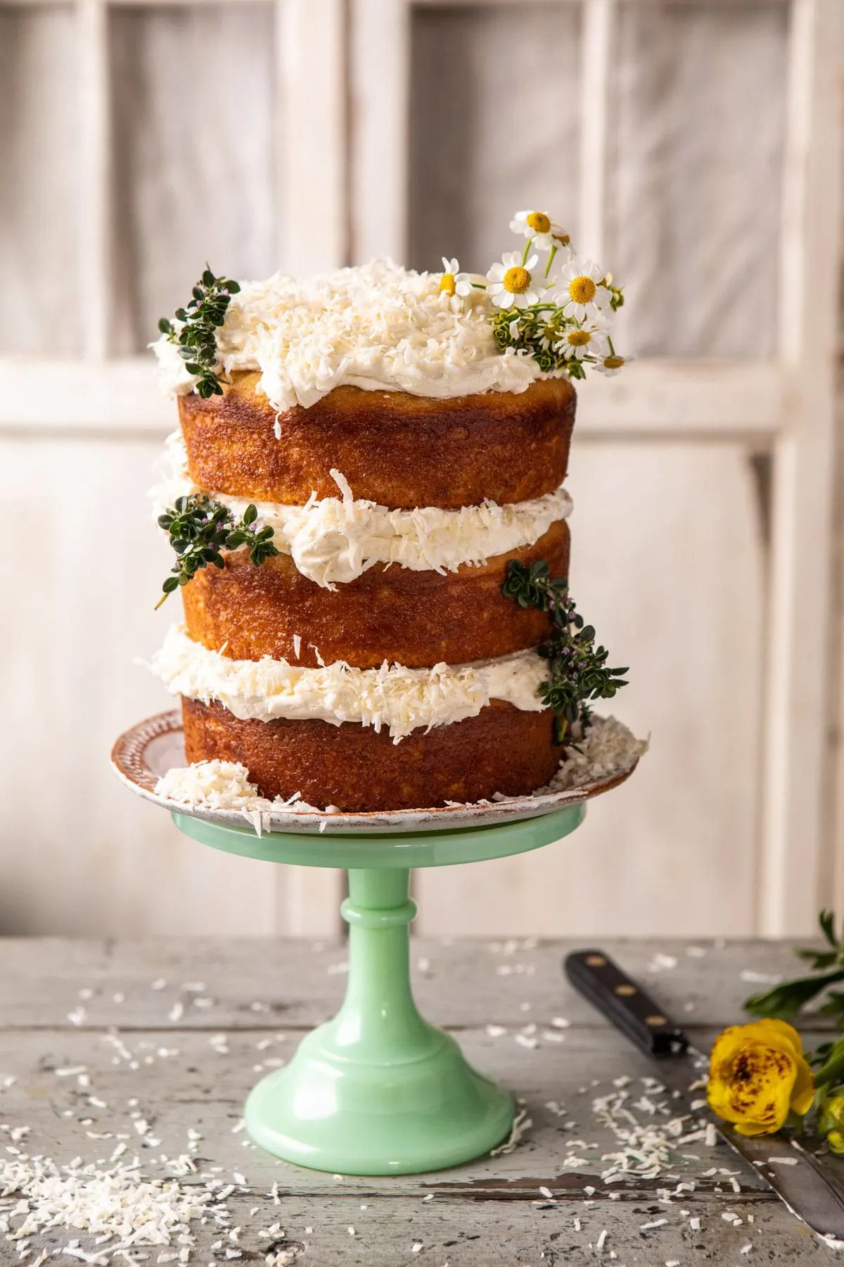 lemon-coconut-naked-cake-with-whipped-vanilla-buttercream.