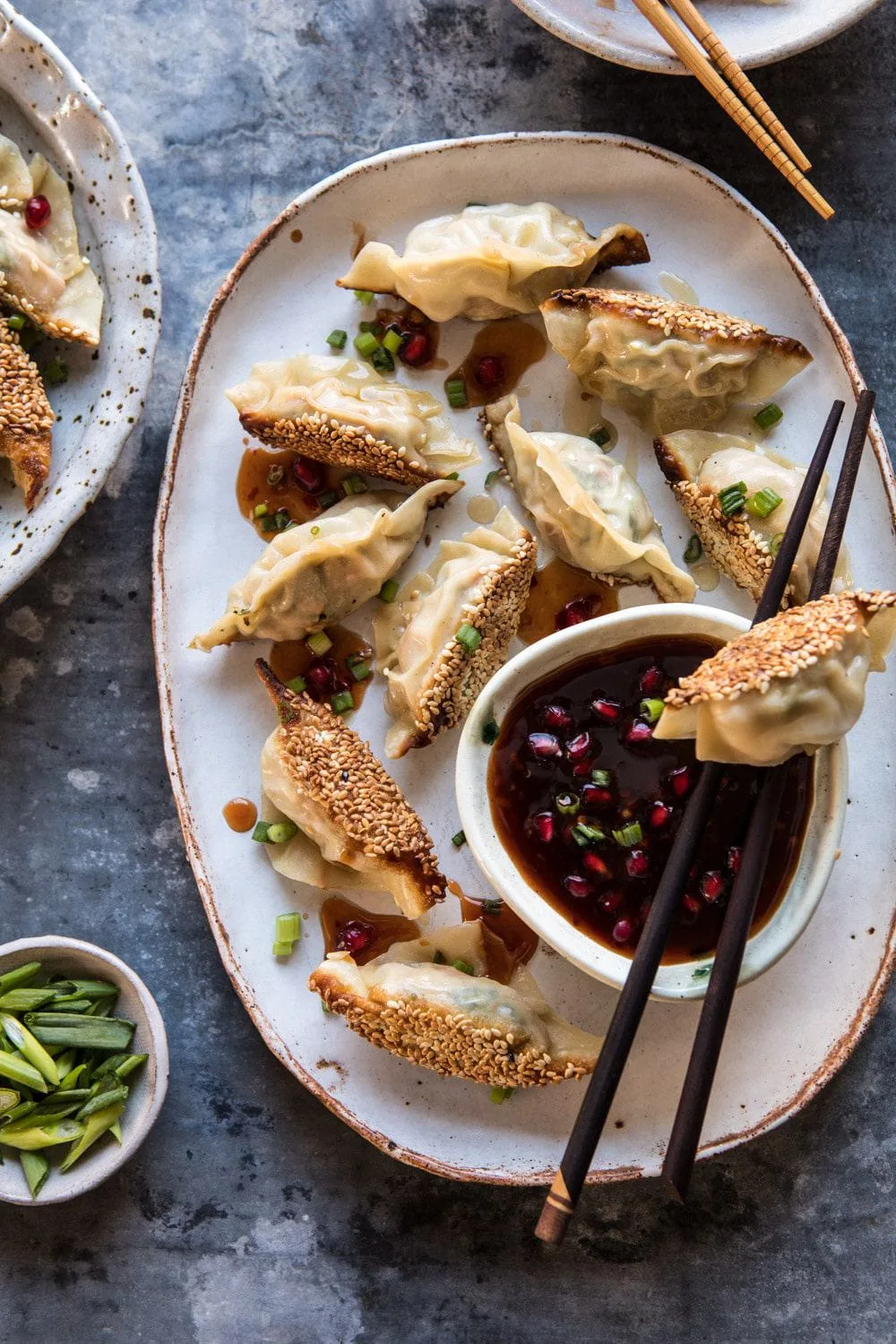 ginger-sesame-chicken-potstickers-with-sweet-chili-pomegranate-sauce