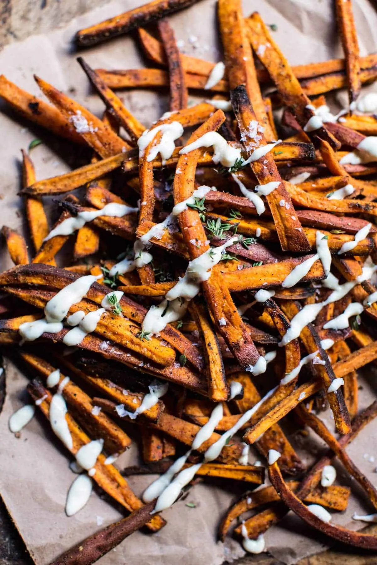 skinny-cajun-sweet-potato-fries-with-garlic-cheese-sauce.