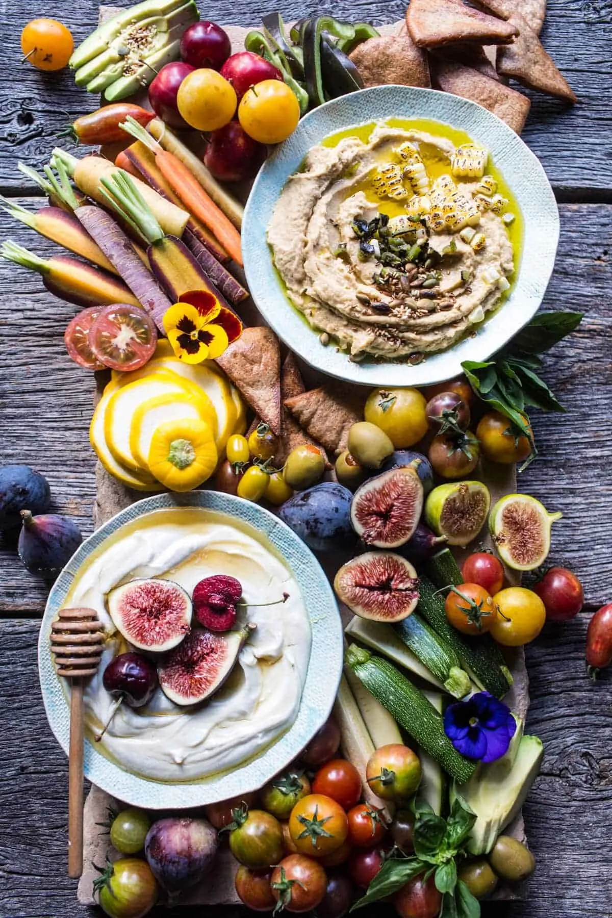 market-veggie-board-with-roasted-corn-jalapeno-hummus-honey-whipped-goat-cheese.