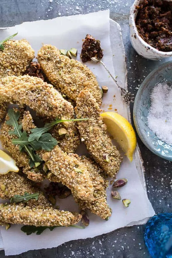 pistachio-quinoa-dukkah-crusted-chicken-fingers-with-sun-dried-tomato-pesto.