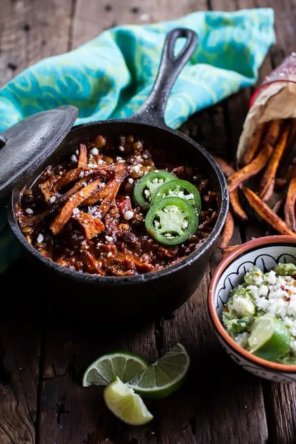 spicy-black-bean-and-lentil-chili-with-cotija-guacamole-chipotle-sweet-potato-fries.