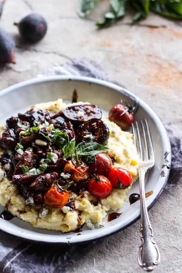 balsamic-fig-glazed-pork-wblistered-cherry-tomatoes-and-creamy-gorgonzola-polenta.