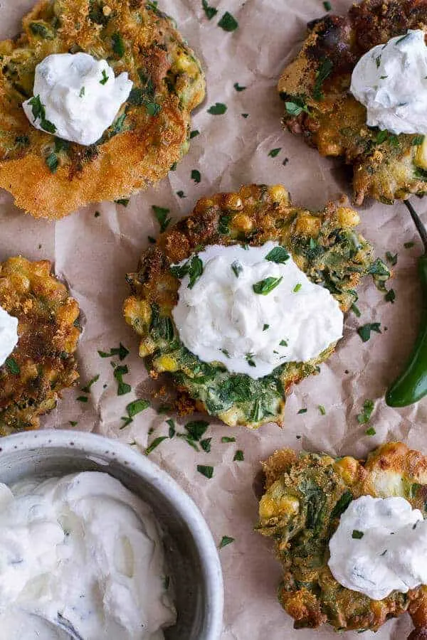 spinach-and-artichoke-corn-fritters-with-brie-and-sweet-honey-jalapeno-cream.