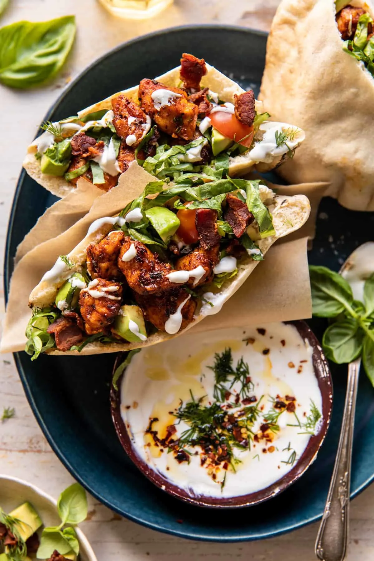 rosemary-chicken-and-avocado-bacon-pitas-with-honey-feta-sauce