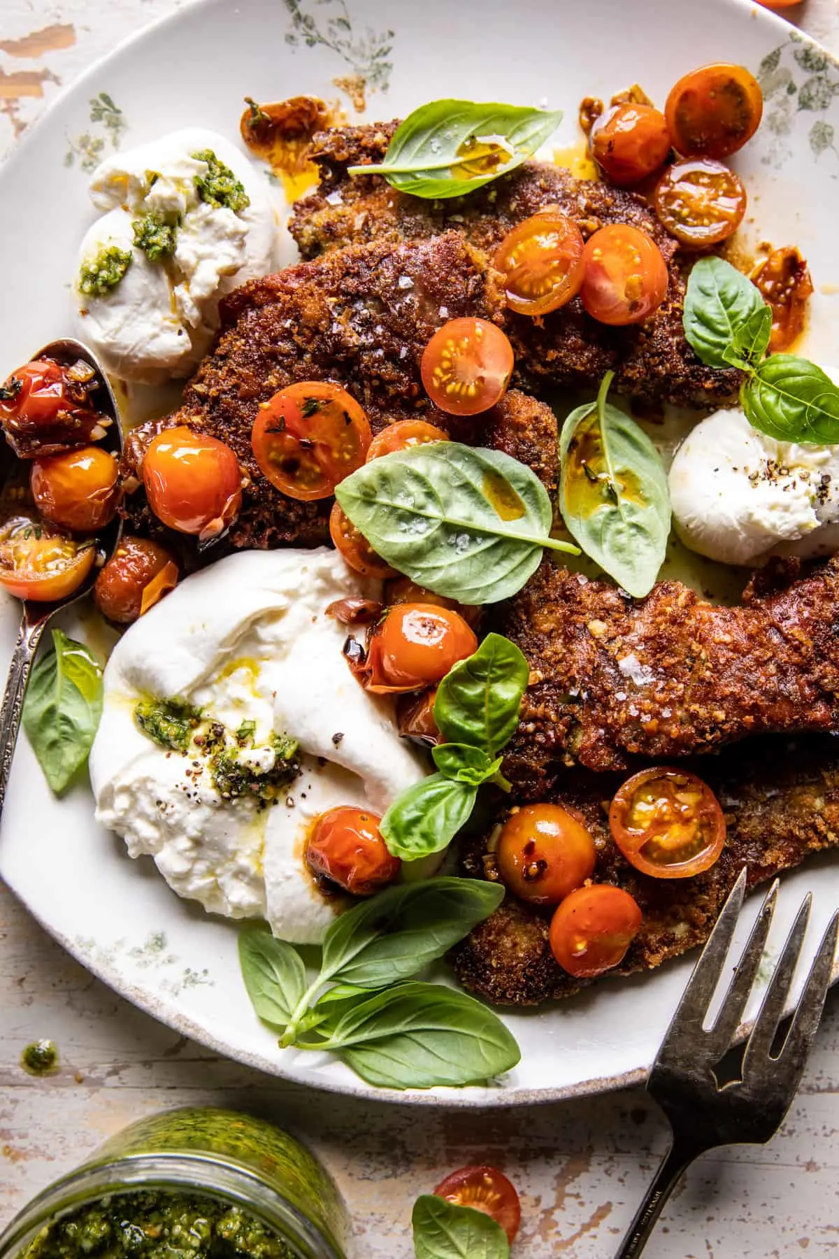 pesto-chicken-saltimbocca-with-burst-tomatoes-and-burrata