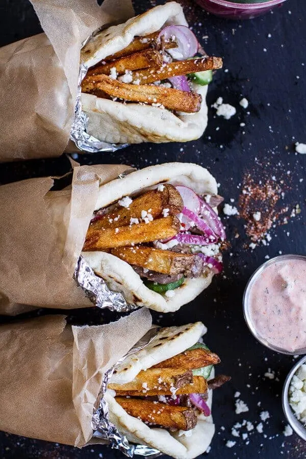 greek-style-roasted-lamb-gyros-with-harissa-spiced-tzatziki