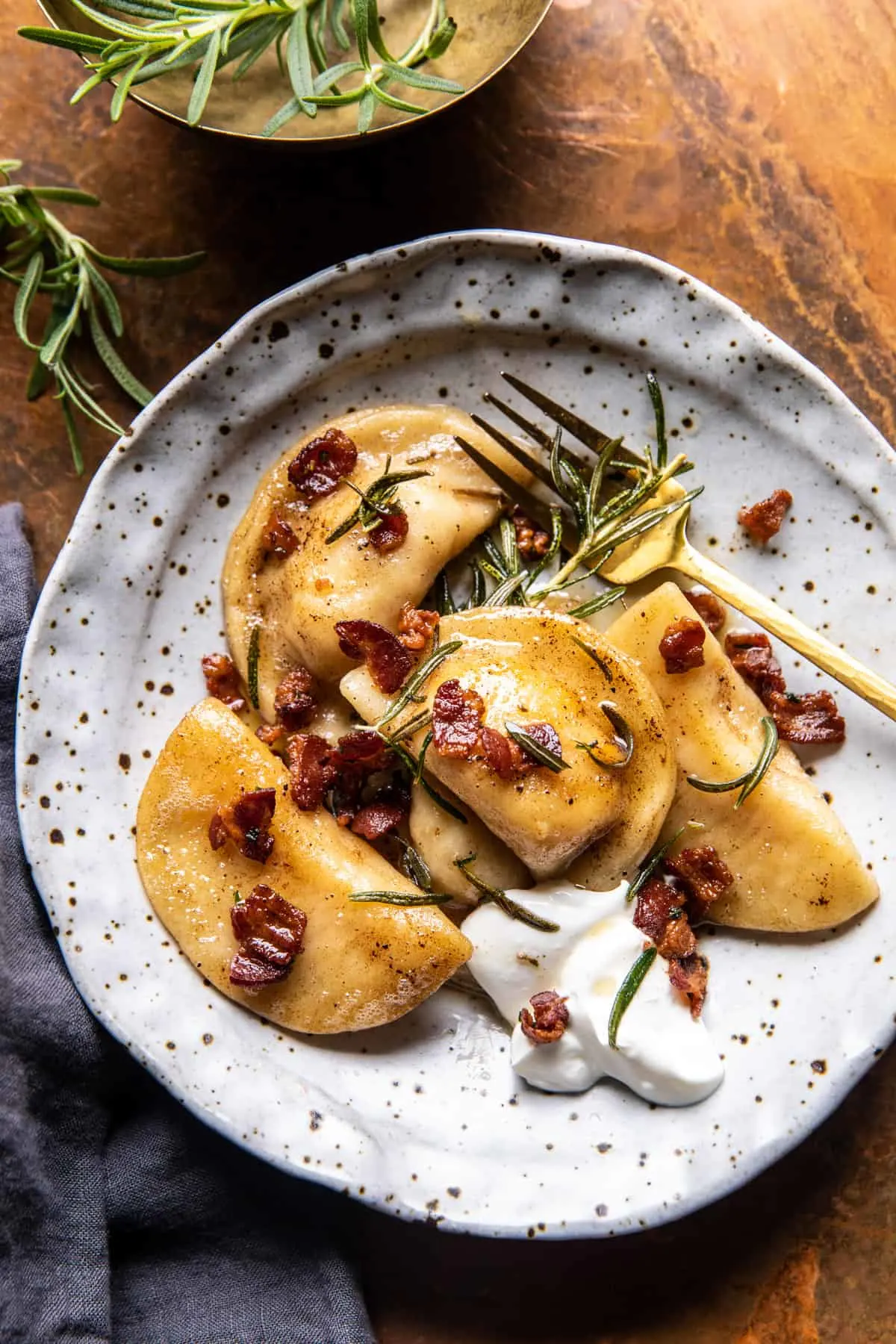 roasted-garlic-potato-cheddar-pierogi-with-rosemary-butter