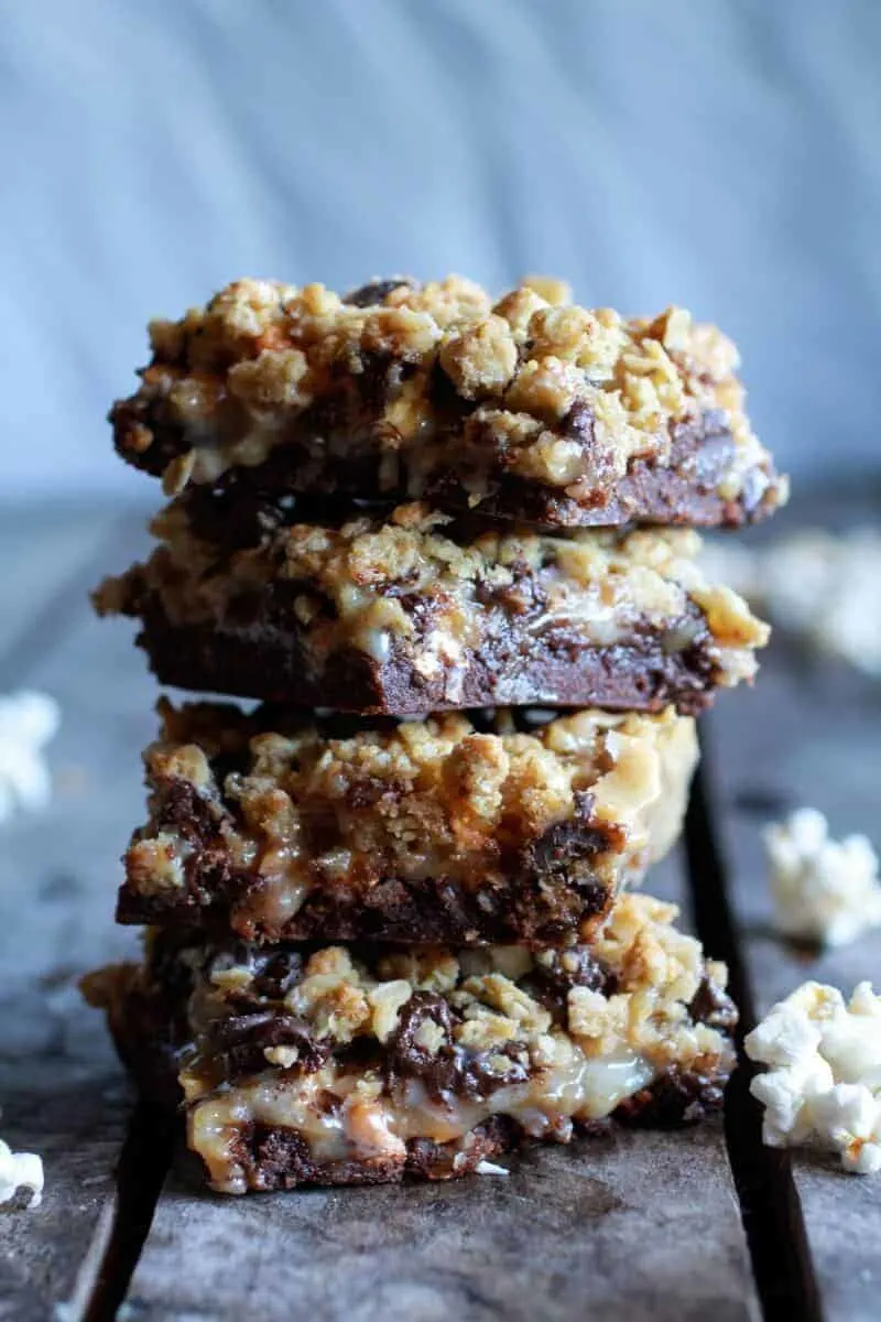 fudge-brownie-caramel-popcorn-oatmeal-cookie-crumble-7-layer-bars