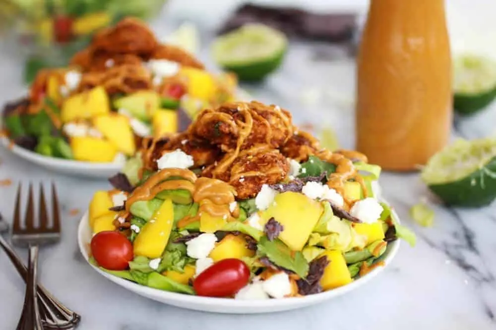 tortilla-chip-crusted-chicken-salad-with-avocado-chipotle-lime-dressing-and-queso-fresco