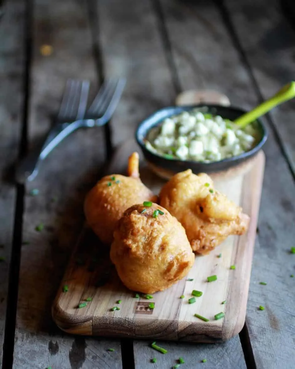 blue-cheese-lobster-beignets-with-spicy-avocado-cream-garden-veggie-saute