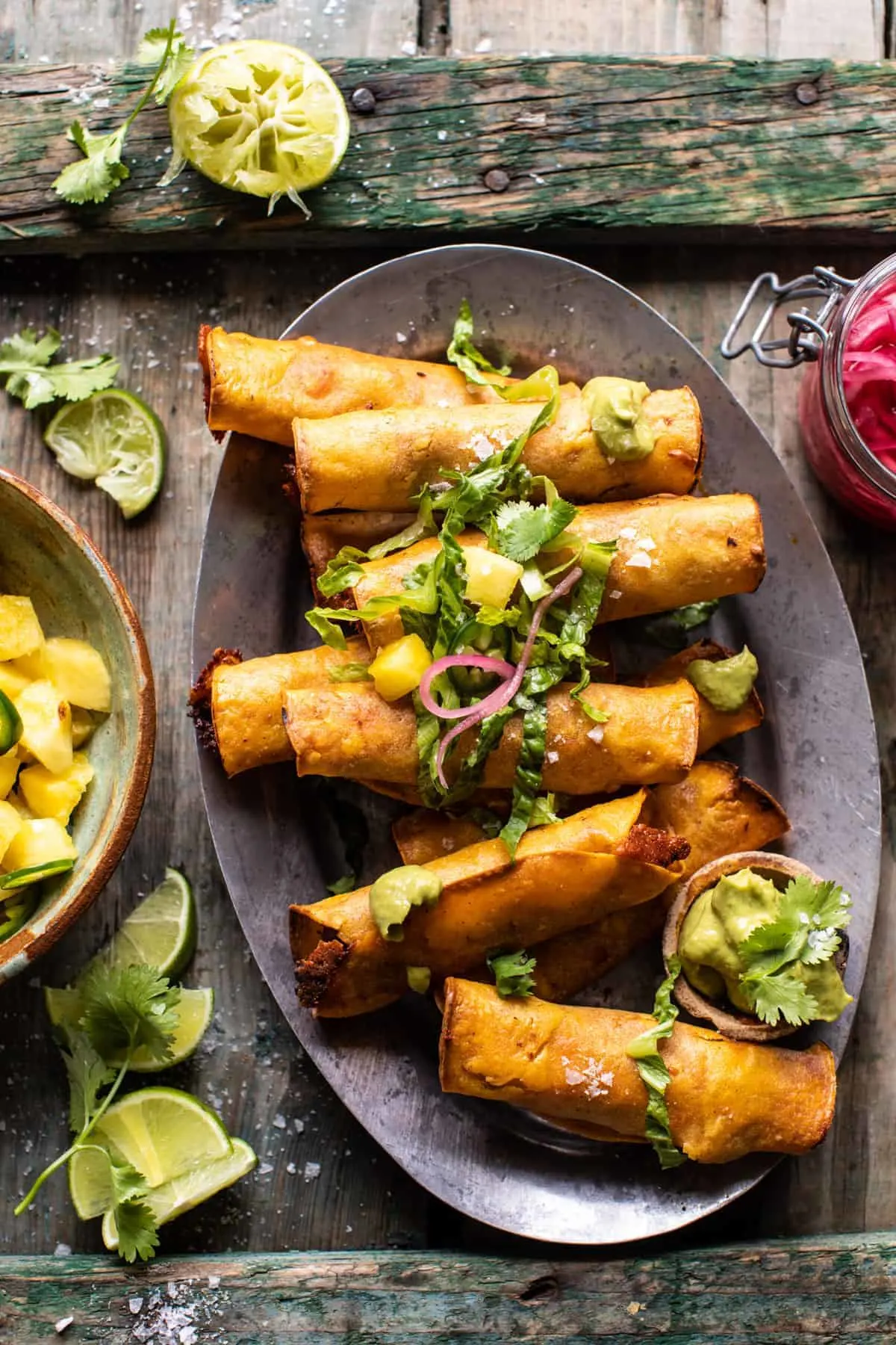 crispy-chicken-tinga-taquitos-with-lime-avocado-crema
