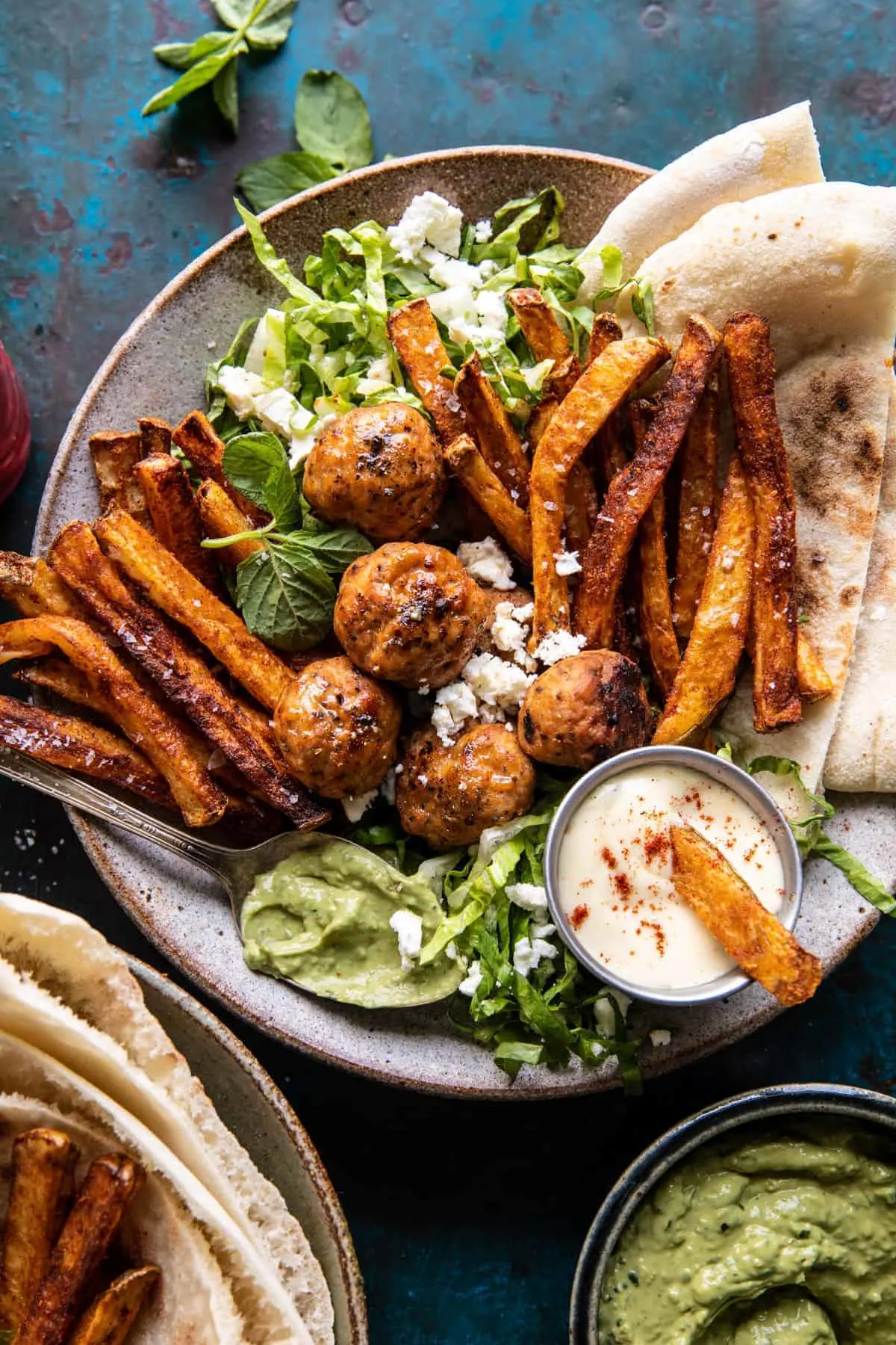 chicken-meatball-pita-bowls-with-seasoned-fries-and-feta
