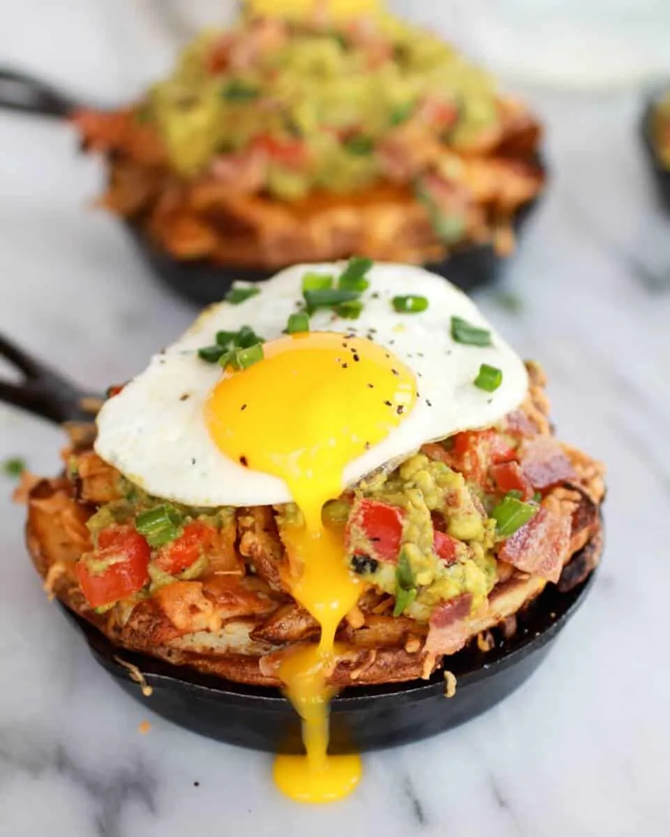 cheesy-cajun-fries-with-cajun-guacamole-bacon-and-fried-eggs