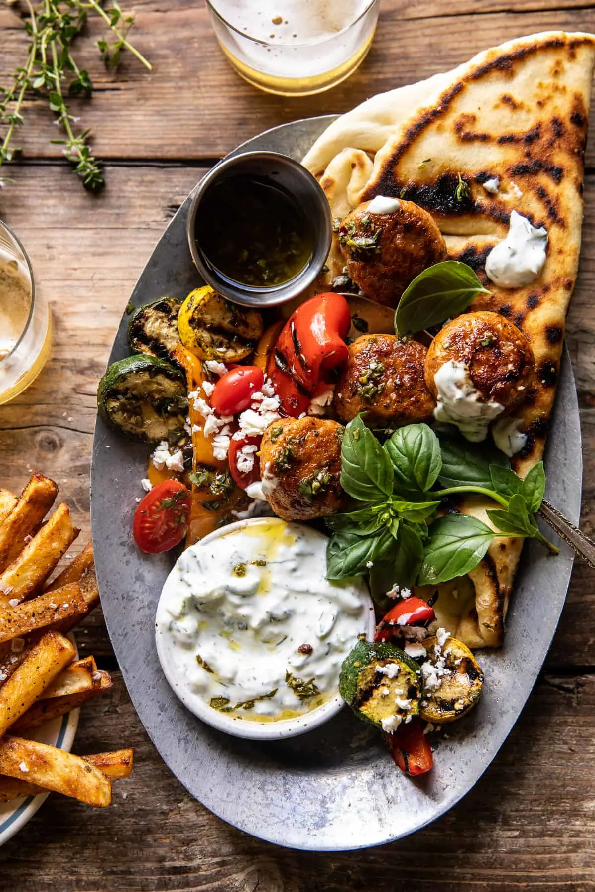 spicy-oregano-meatballs-with-grilled-vegetables-and-tzatziki