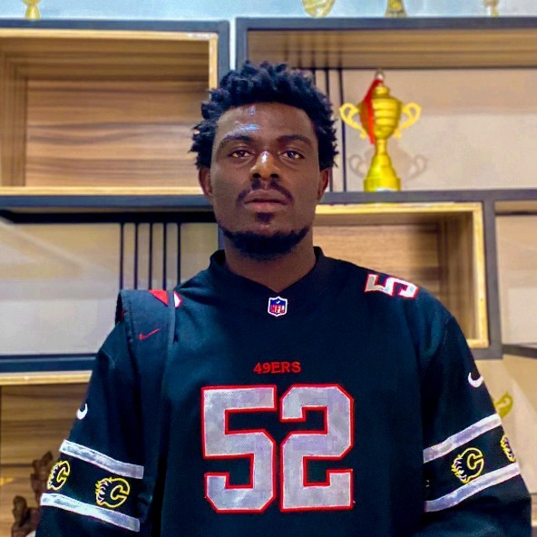 Professional headshot of David Giwa, Virtual Assistant, Creative Designer, and Health & Safety Lead