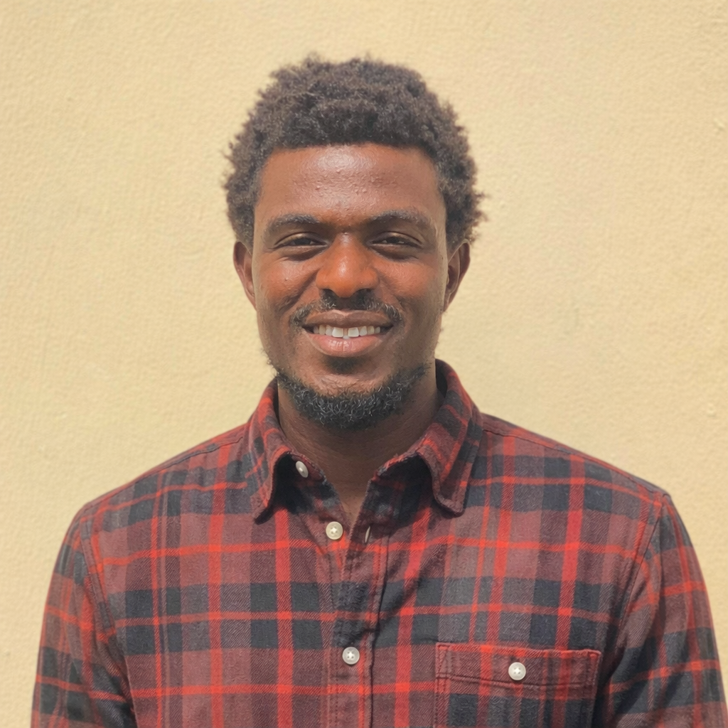 Professional headshot of David Giwa, Virtual Assistant, Creative Designer, and Health & Safety Lead