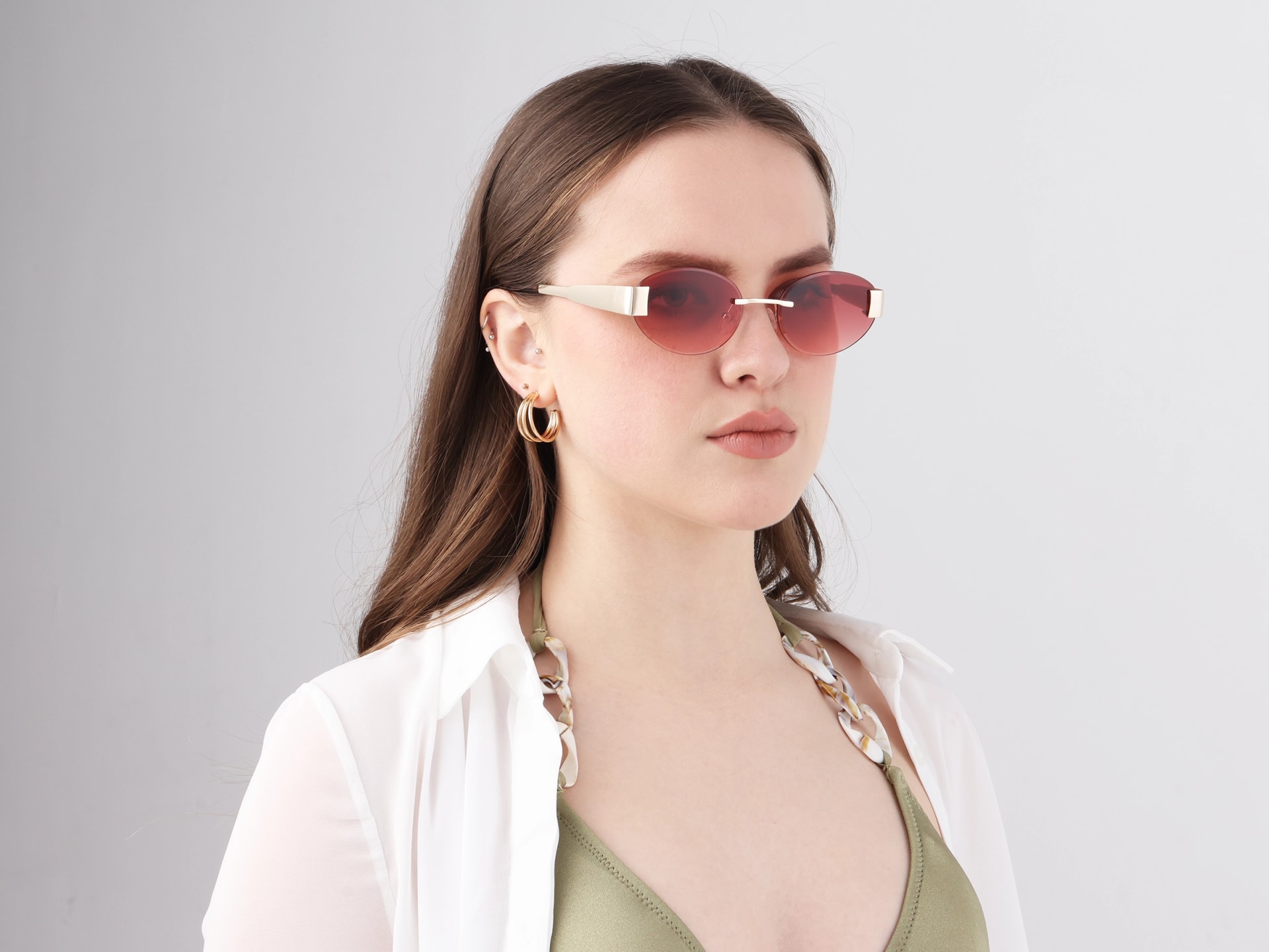 Oval Champange Gold Rimless Sunglasses