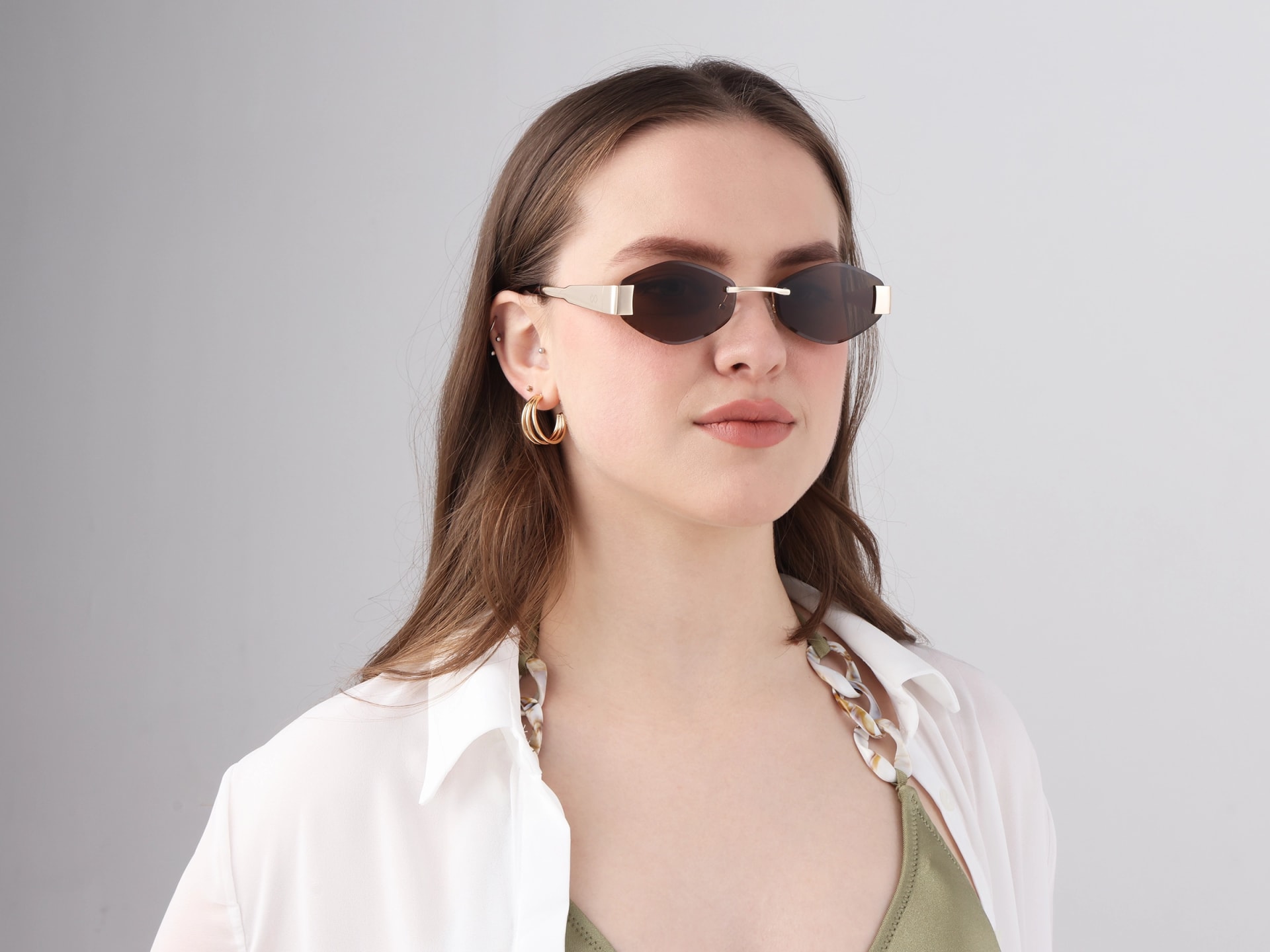 Champagne Gold Oval Rimless Sunglasses