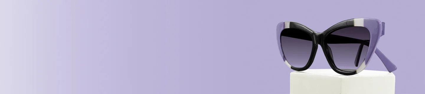 Oversized butterfly sunglasses with black frames and purple marbled accents on a white pedestal, set against a soft purple gradient banner background.