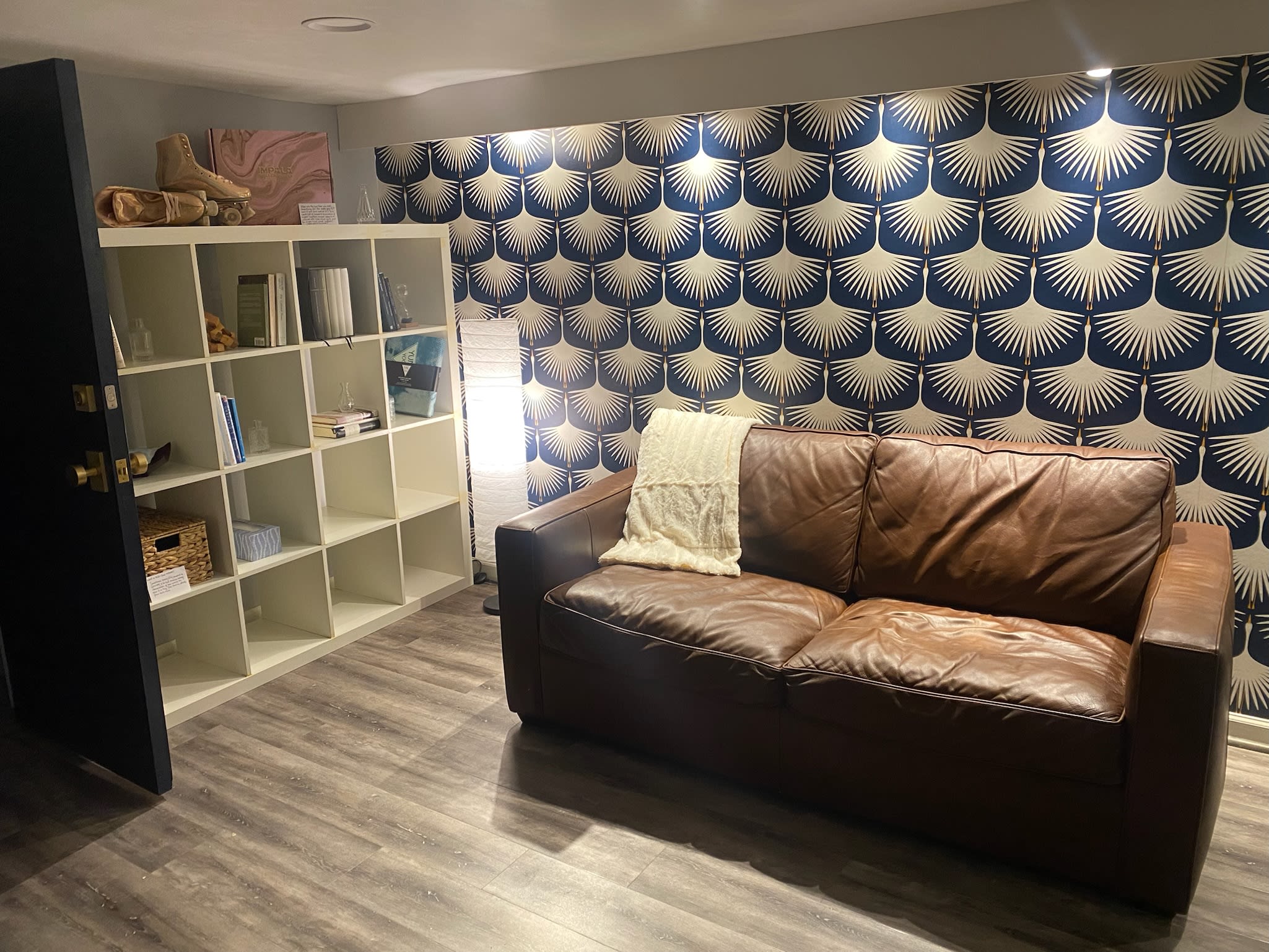 Cozy living and sleeping space with tufted headboard